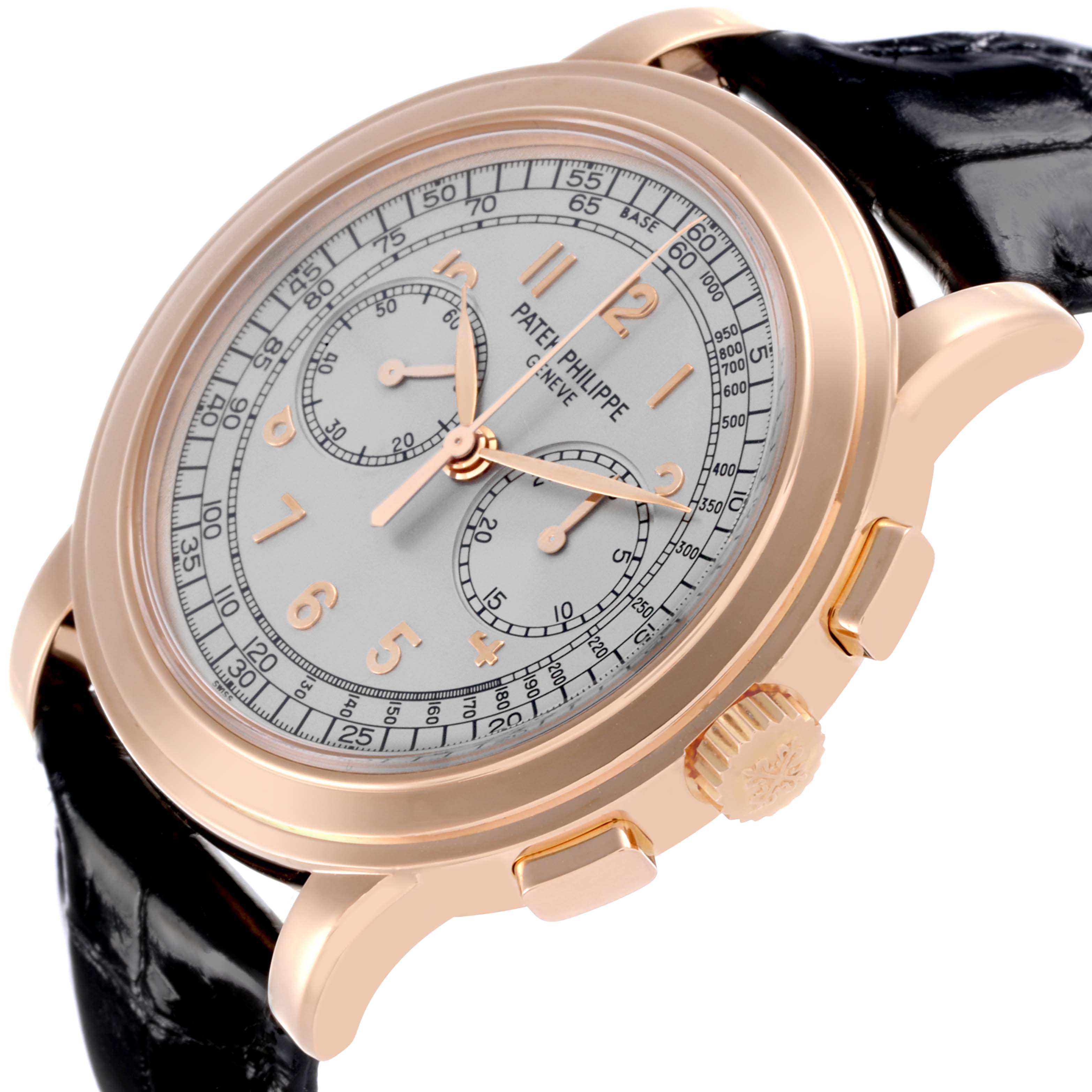 The Patek Philippe Complications 5070R Men's Rose Gold Silver Dial 5070R Men's Rose Gold Silver Dial watch is shown from a three-quarter angle, highlighting the face, case, crown, and pushers.