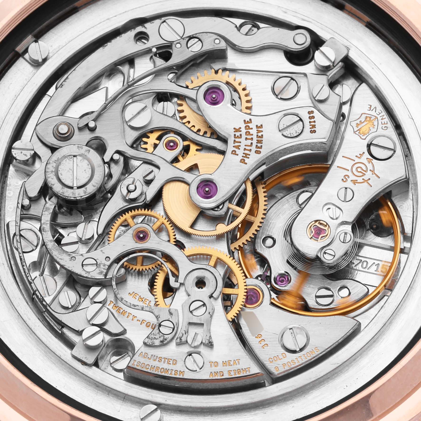 The image shows the intricate movement of a Patek Philippe Complications 5070R Men's Rose Gold Silver Dial 5070R Men's Rose Gold Silver Dial watch from a back or transparent case angle.