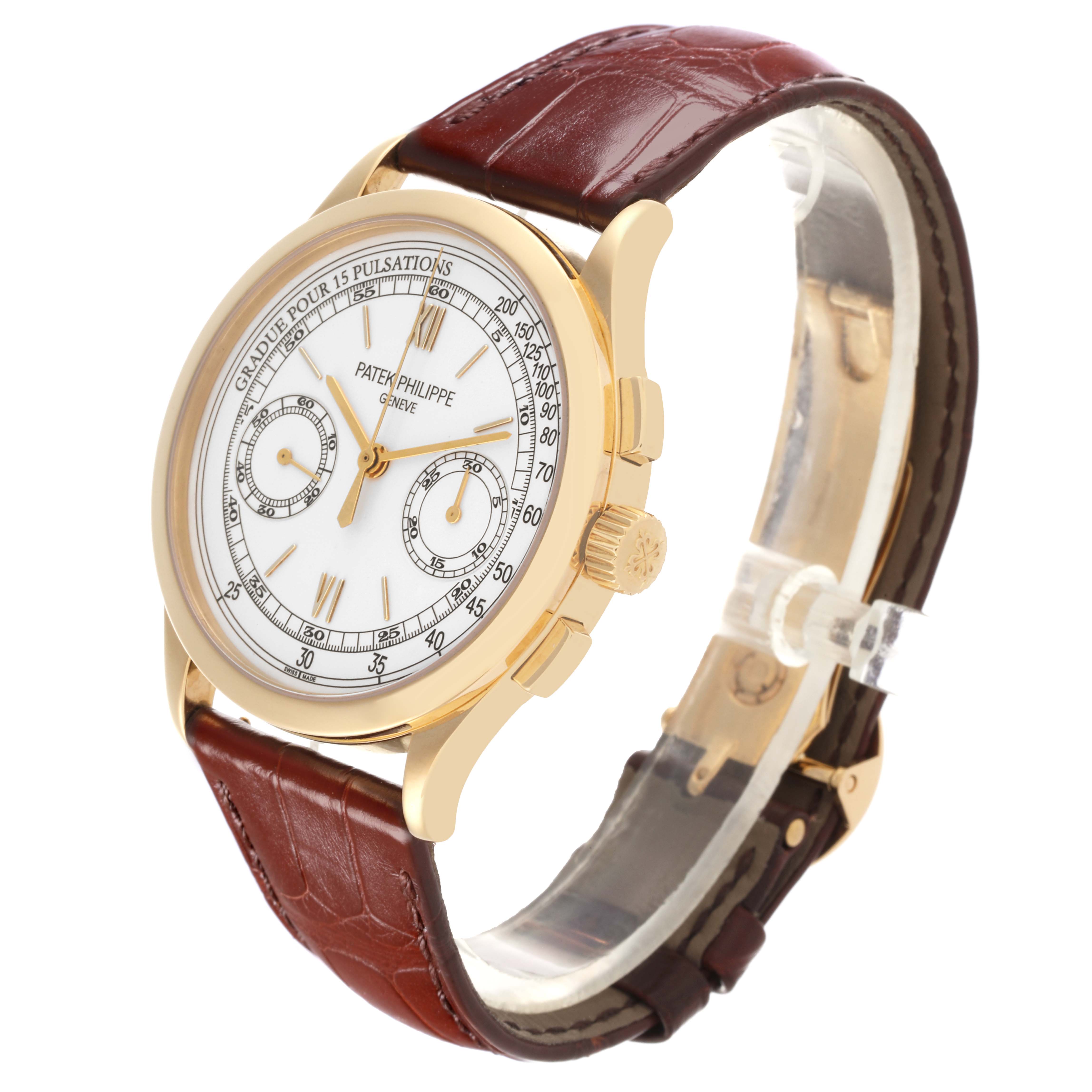 The Patek Philippe Complications 5170J Men's Yellow Gold Silver Dial 5170J Men's Yellow Gold Silver Dial watch is shown at a 3/4 angle, displaying the dial, case, crown, and leather strap.