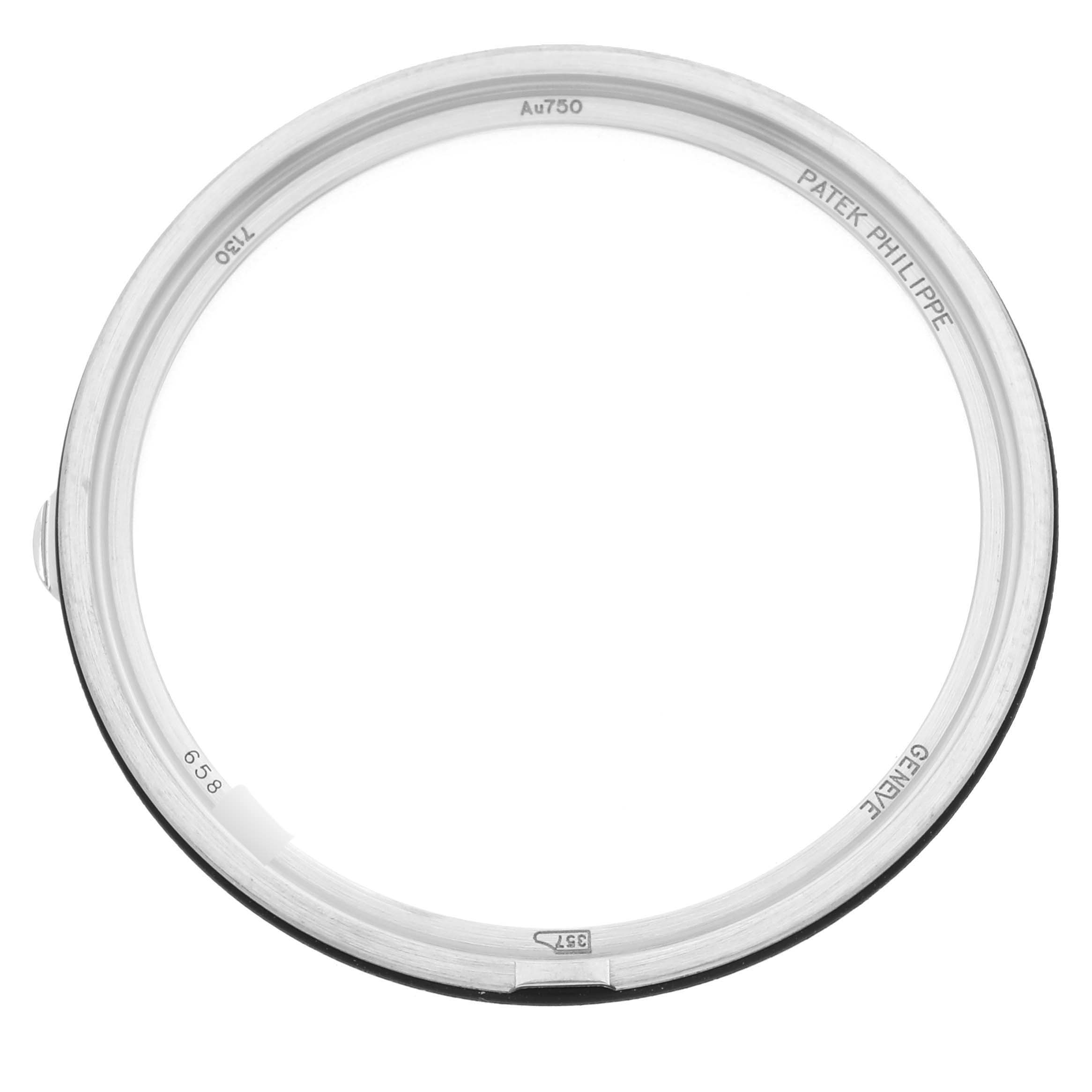 The image shows the outer case ring of a Patek Philippe Complications 7130G-016 Men's White Gold Blue Dial 7130G-016 Men's White Gold Blue Dial model, viewed from the top angle.