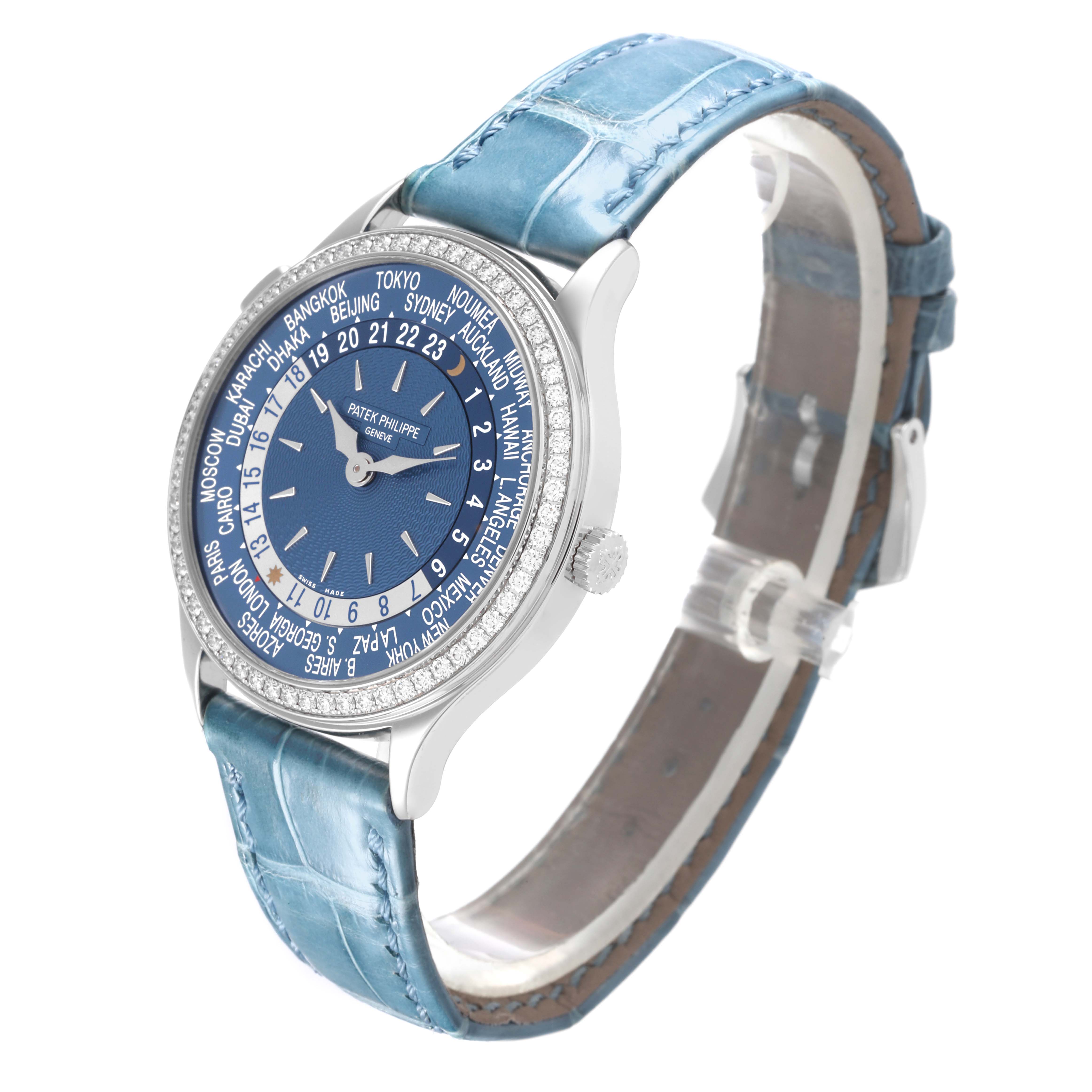 The Patek Philippe Complications 7130G-016 Men's White Gold Blue Dial 7130G-016 Men's White Gold Blue Dial watch is shown at a side angle, highlighting its bezel, dial, and blue leather strap.