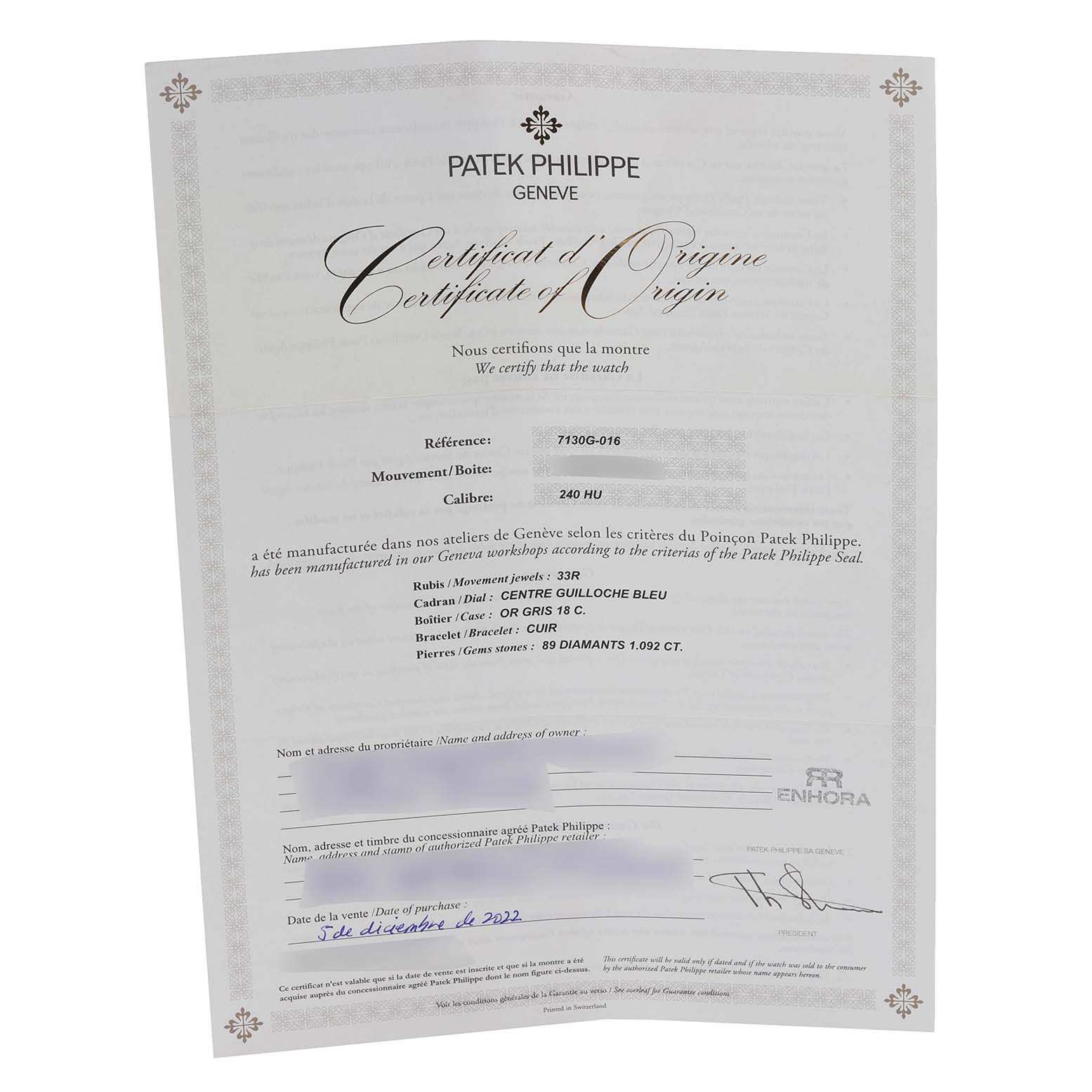 The image shows a Certificate of Origin for the Patek Philippe Complications 7130G-016 Men's White Gold Blue Dial 7130G-016 Men's White Gold Blue Dial model, with specifications and details.