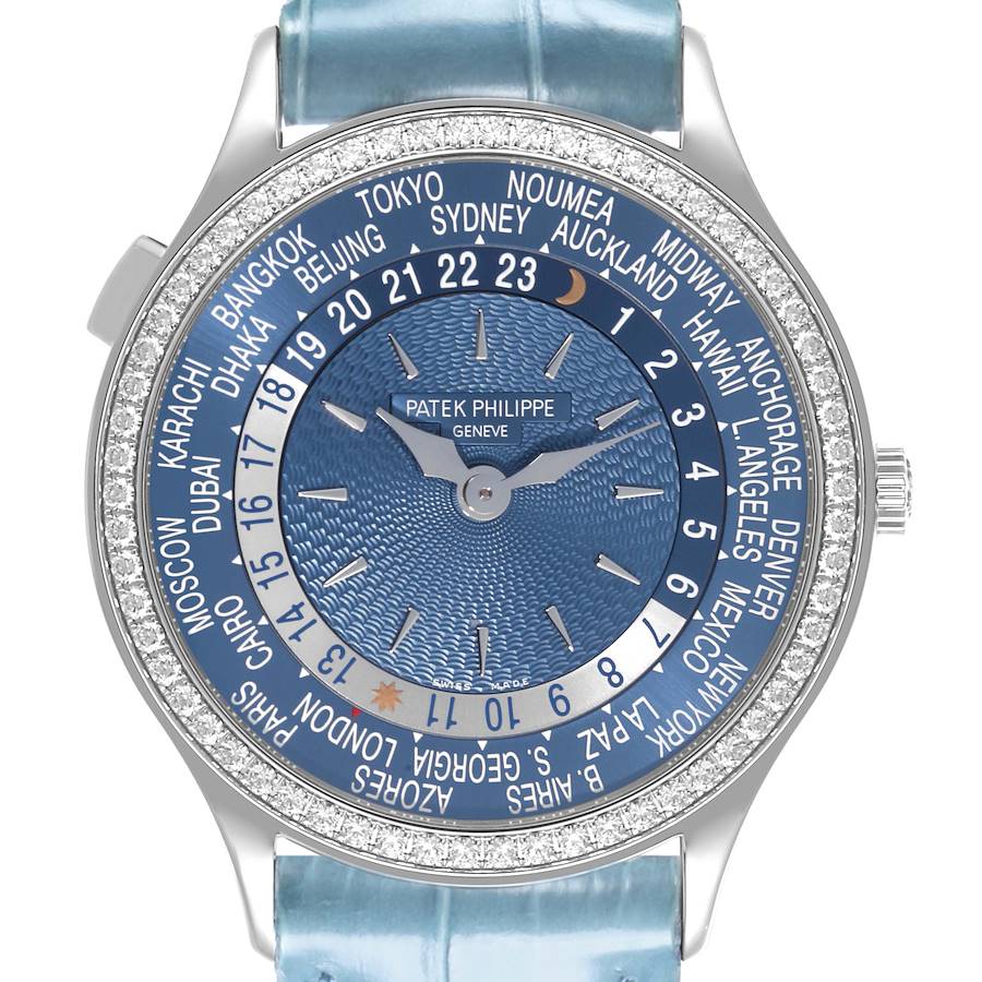 The Patek Philippe Complications watch is shown from the front, displaying the full dial and bezel with world time zones.