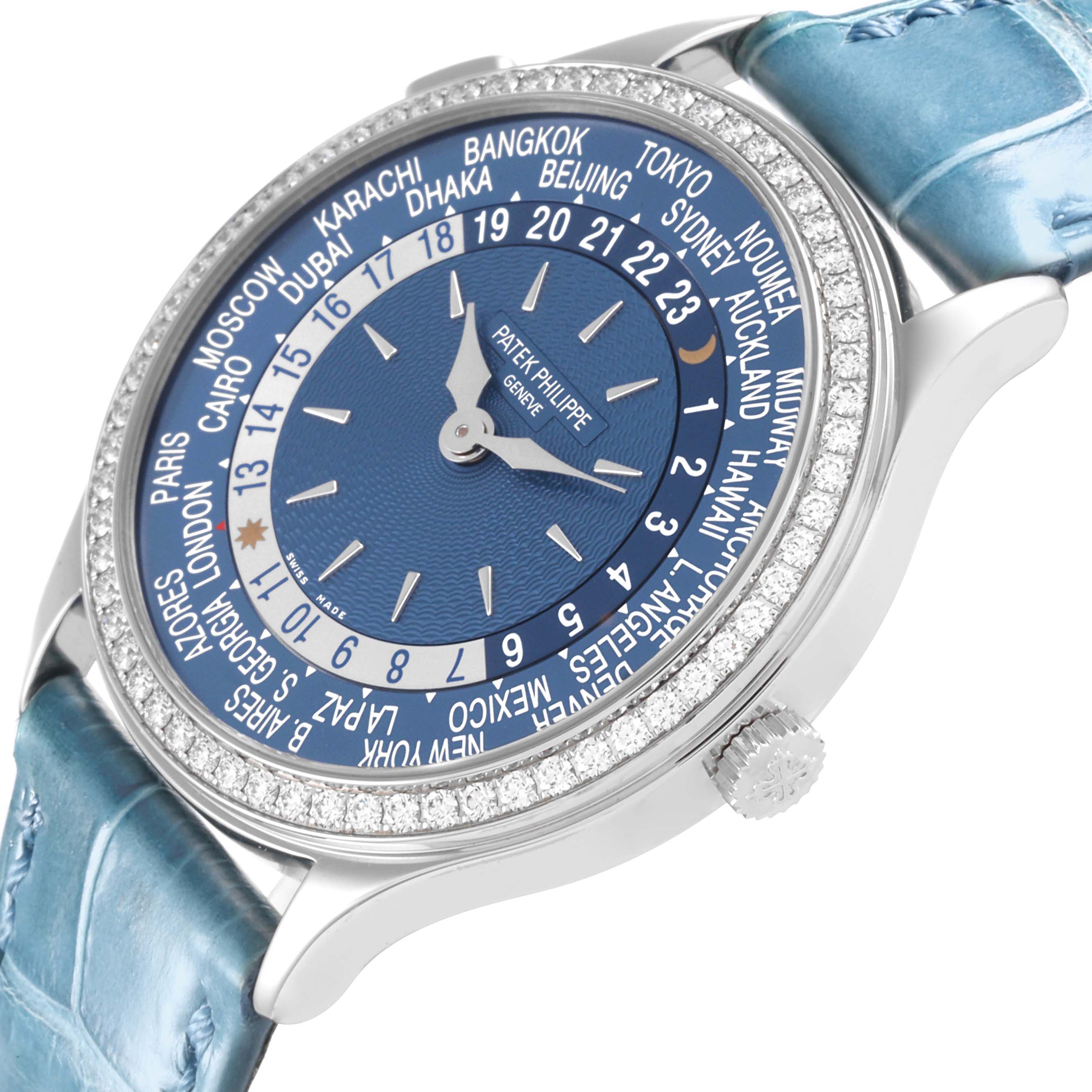 The Patek Philippe Complications 7130G-016 Men's White Gold Blue Dial 7130G-016 Men's White Gold Blue Dial watch is shown from a side angle, displaying the blue dial, bezel, and crown.