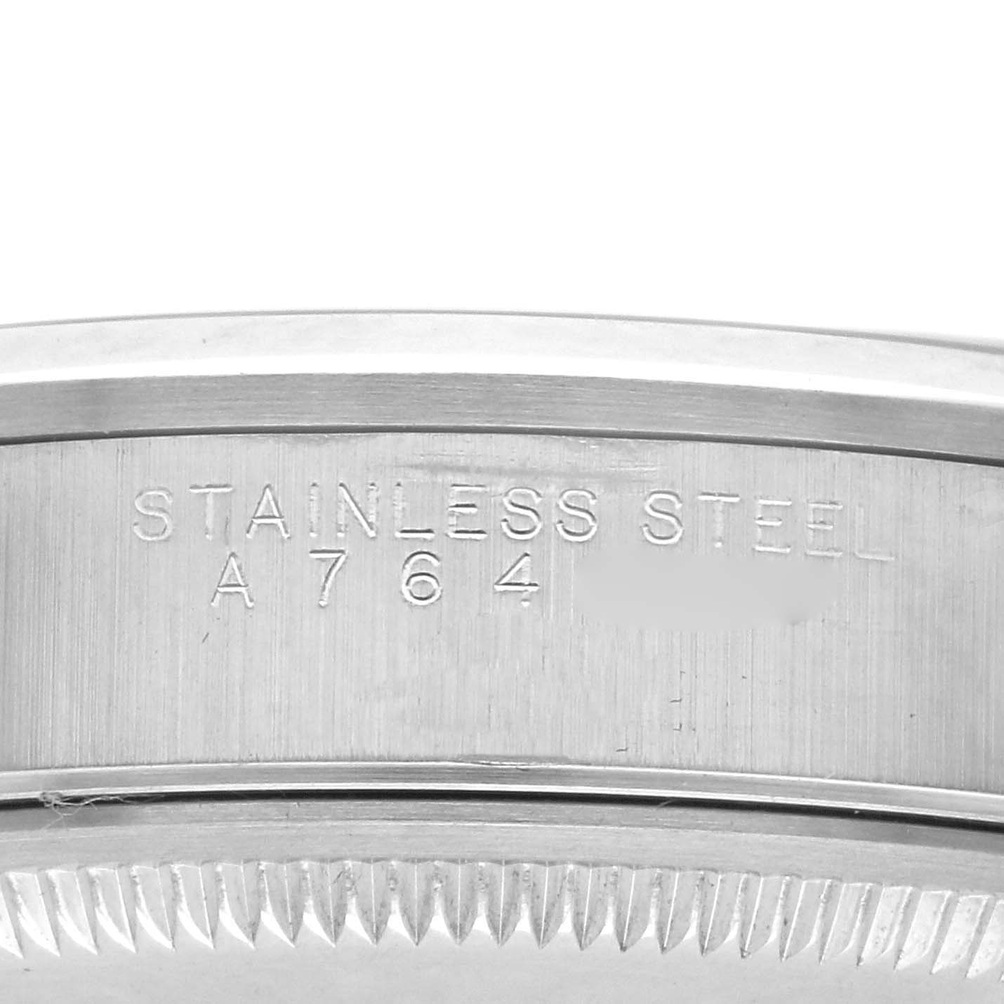 The image shows the side view of the Rolex Air-King 14000 Men's Stainless Steel Pink Dial 14000 Men's Stainless Steel Pink Dial, highlighting the engraving and stainless steel material.