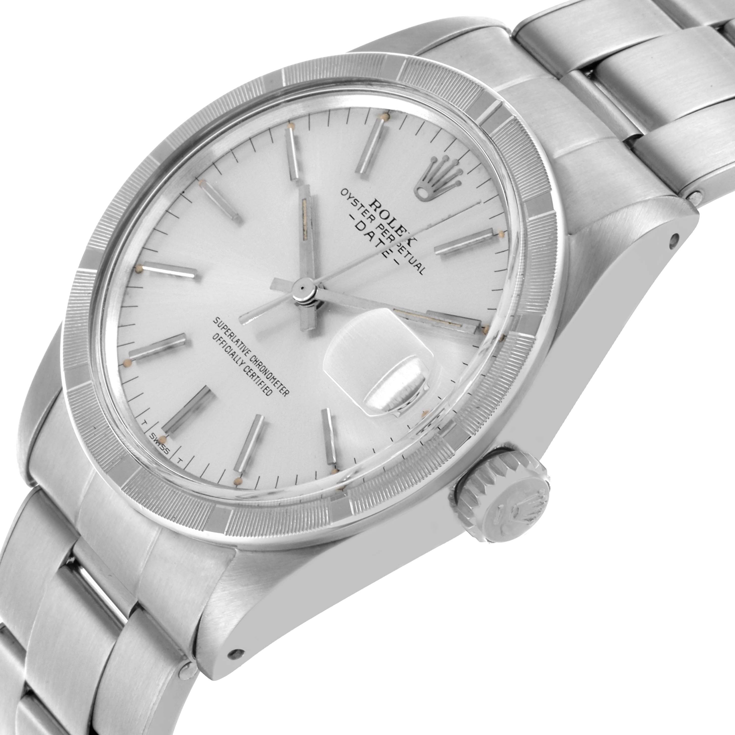 The Rolex Date 1501 Men
s Stainless Steel Silver Dial 1501 Men
s Stainless Steel Silver Dial watch is angled to show the dial, bezel, case, crown, and part of the bracelet.