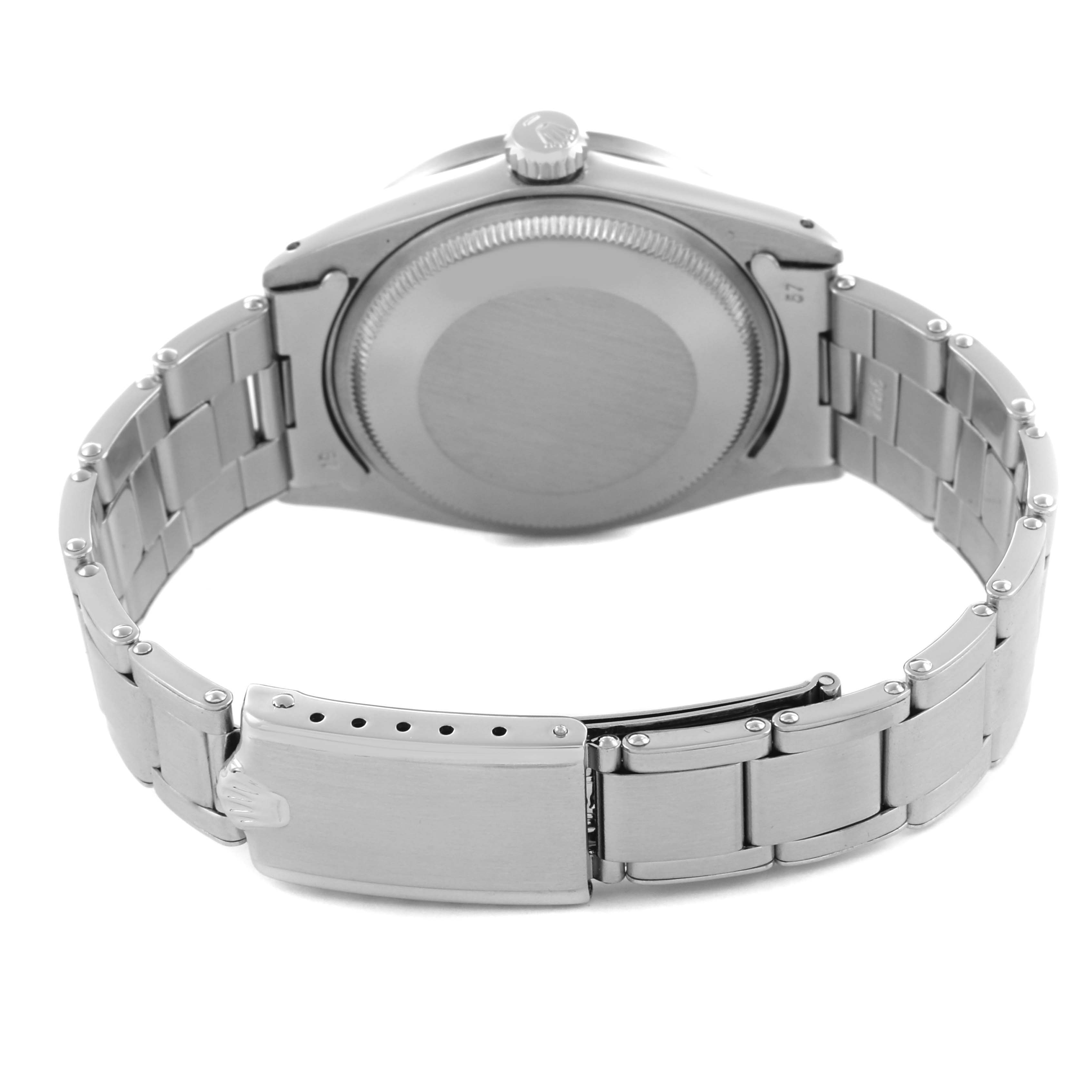 The image shows the back and clasp of a Rolex Date 1501 Men
s Stainless Steel Silver Dial 1501 Men
s Stainless Steel Silver Dial model watch.