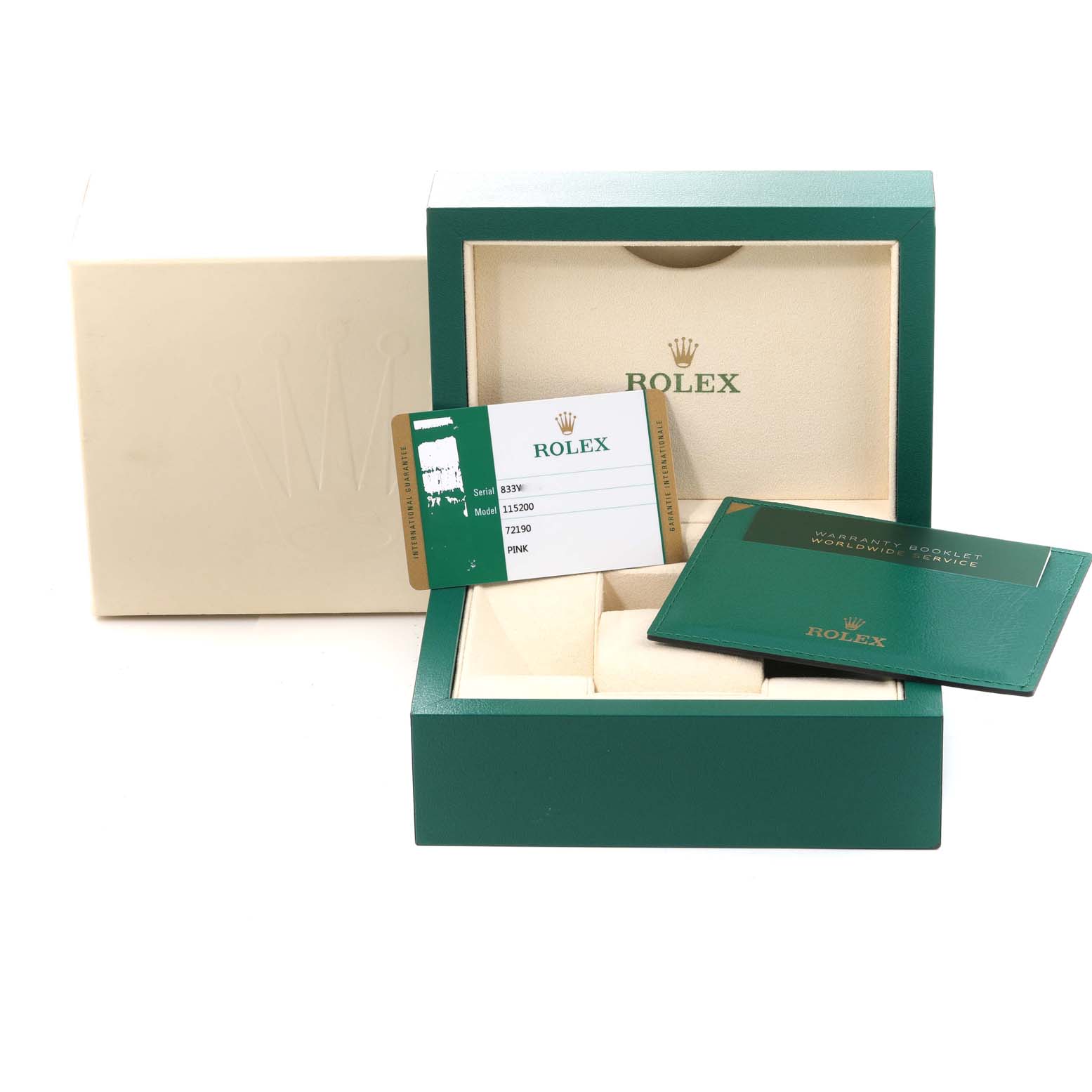 The image shows Rolex Date 115200 Men's Stainless Steel Pink Dial 115200 Men's Stainless Steel Pink Dial model accessories, including the box, warranty card, and booklet, viewed from a front angle.