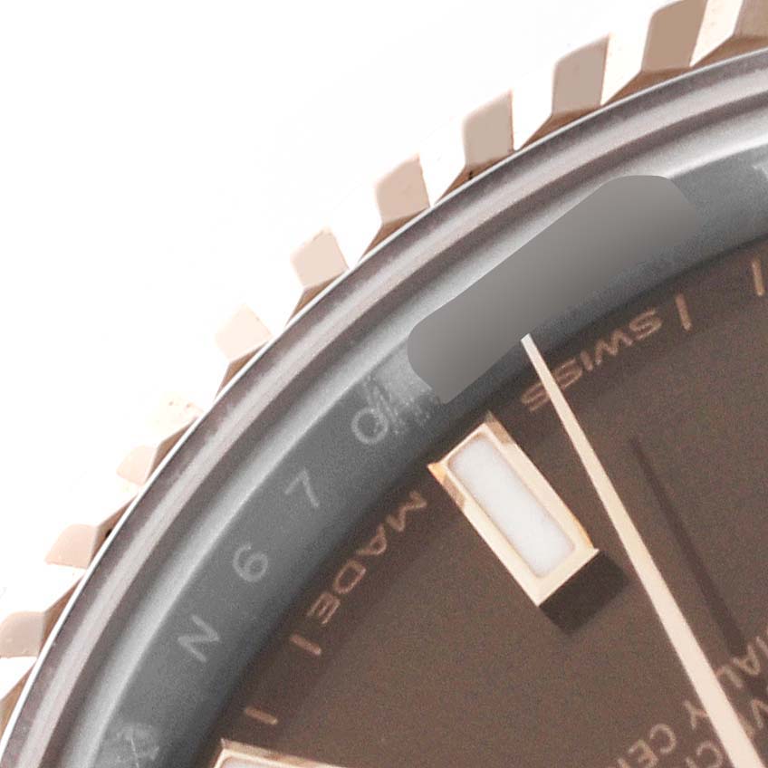 This image shows a close-up of the bezel, dial, and a part of the index of a Rolex Datejust 279171 Women's Steel and Gold (two tone) Brown Dial 279171 Women's Steel and Gold (two tone) Brown Dial watch.