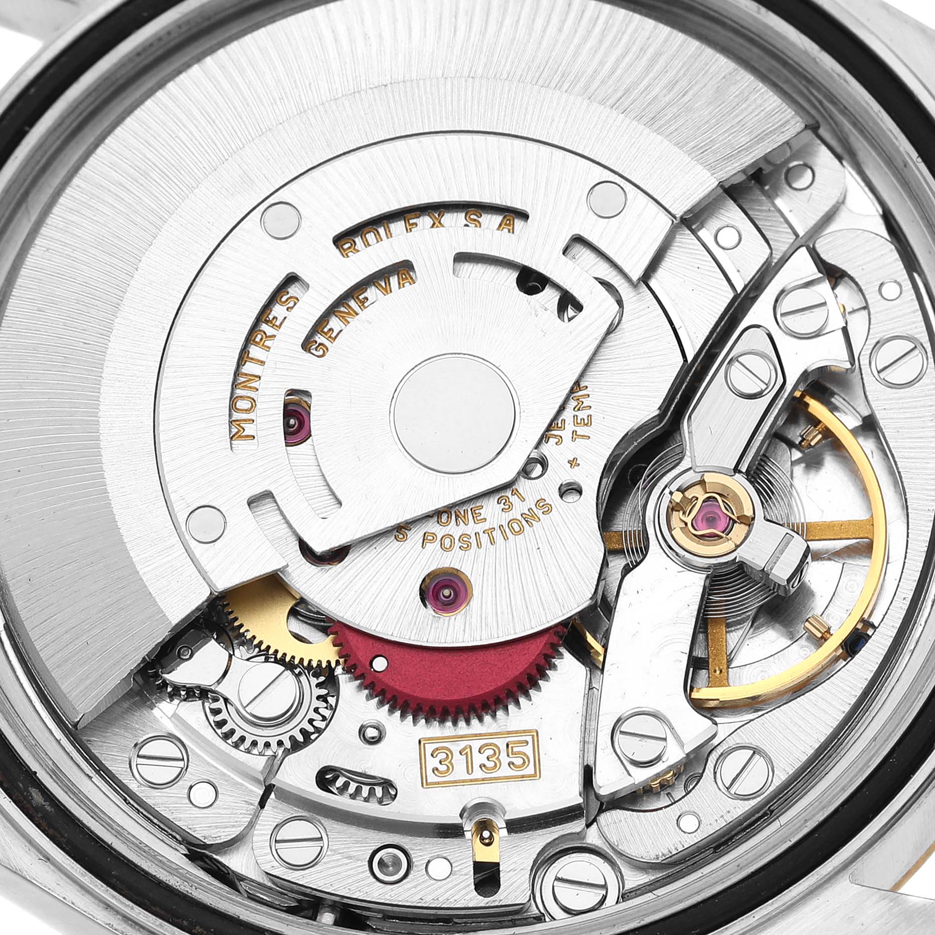 This image shows a close-up of the Rolex Datejust 16233 Men's Steel and Gold (two tone) Silver Dial 16233 Men's Steel and Gold (two tone) Silver Dial's movement components, specifically the caliber 3135 mechanism.