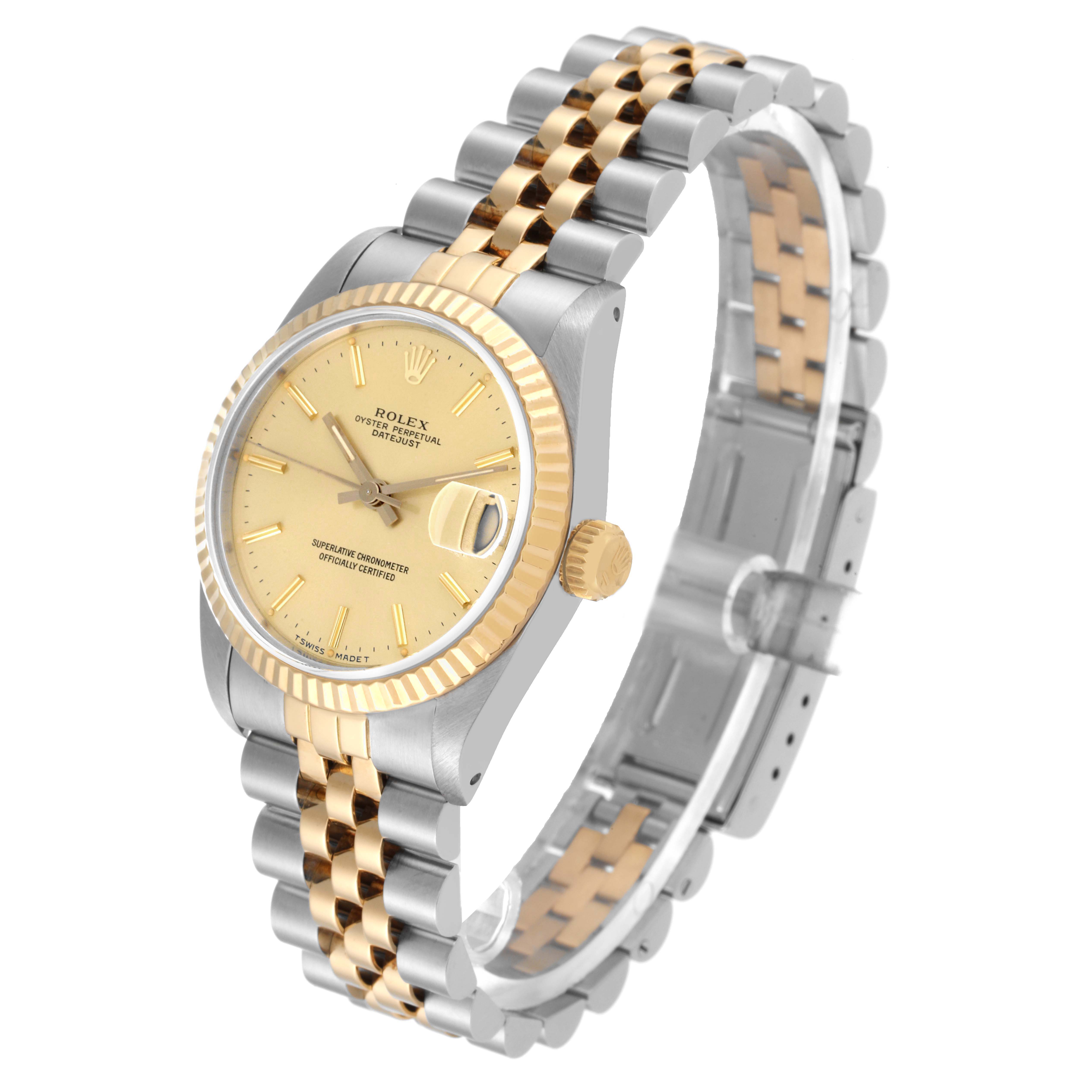 The image shows a Rolex Mid-Size 68273 Women
s Steel and Gold (two tone) Champagne Dial 68273 Women
s Steel and Gold (two tone) Champagne Dial watch angled to display the dial, bezel, crown, and bracelet.