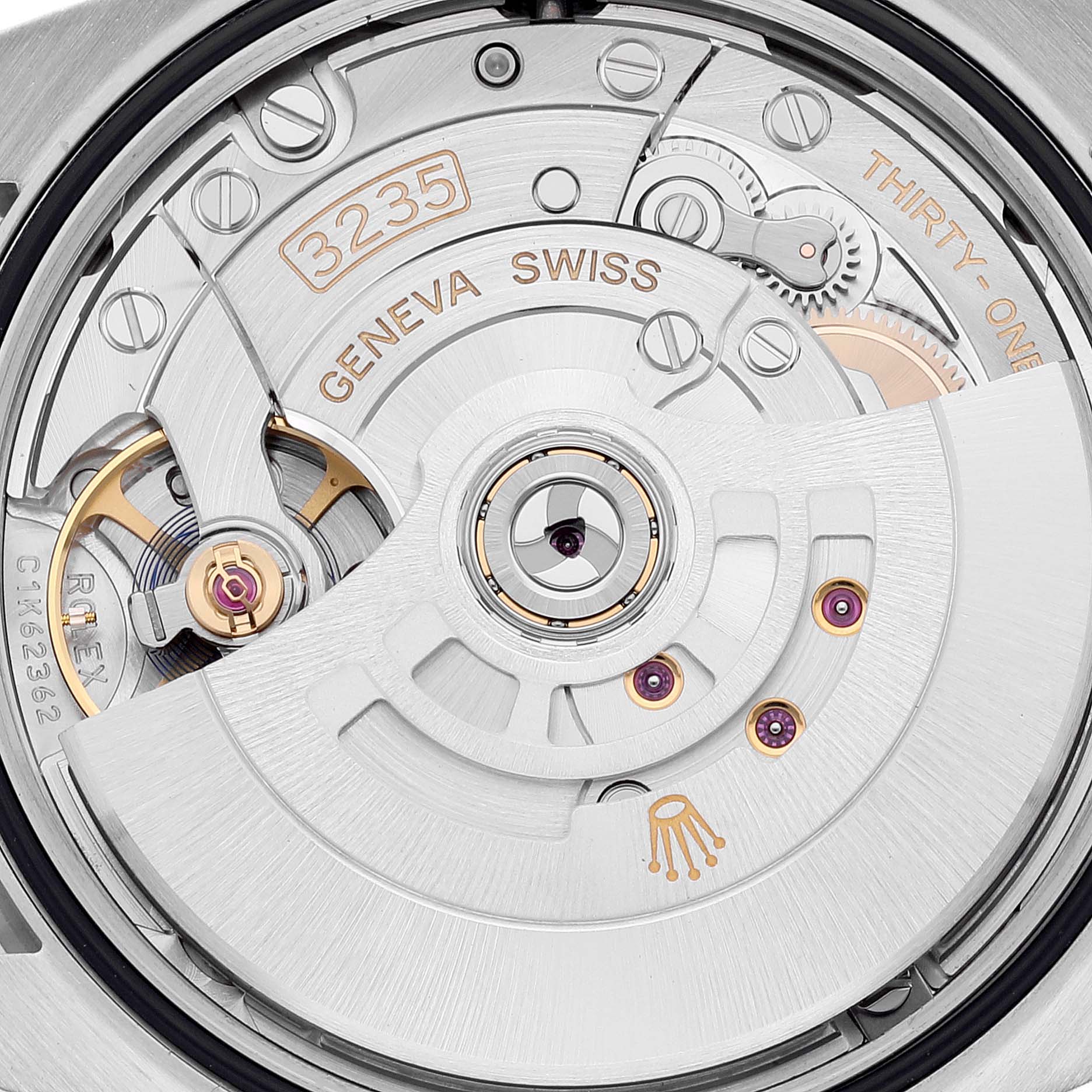 The image shows a close-up of the movement of a Rolex Datejust 126284RBR Men's Stainless Steel Purple Dial 126284RBR Men's Stainless Steel Purple Dial, specifically the Caliber 3235.