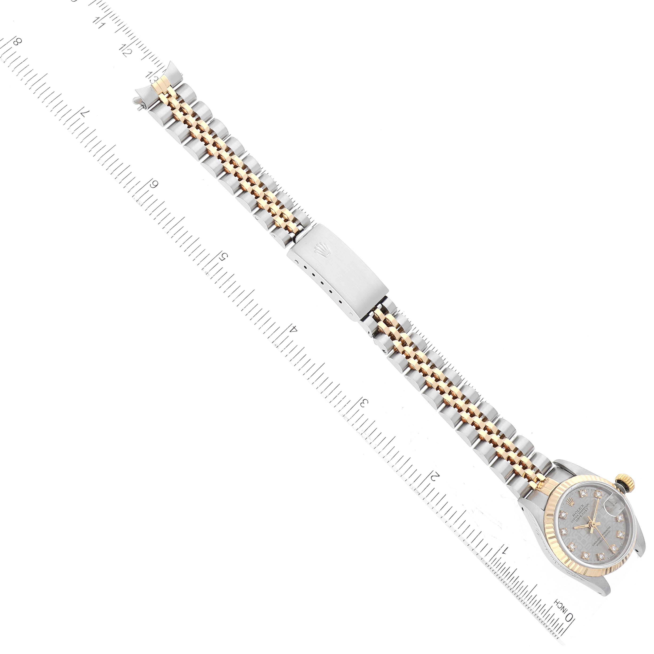 The image shows a top-down view of a Rolex Datejust 69173G Women's Steel and Gold (two tone) Silver Dial 69173G Women's Steel and Gold (two tone) Silver Dial watch, highlighting its face, bezel, bracelet, and clasp.