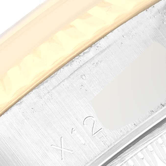 This image shows a close-up of the metal bracelet of a Rolex Datejust 69173G Women's Steel and Gold (two tone) Silver Dial 69173G Women's Steel and Gold (two tone) Silver Dial watch.