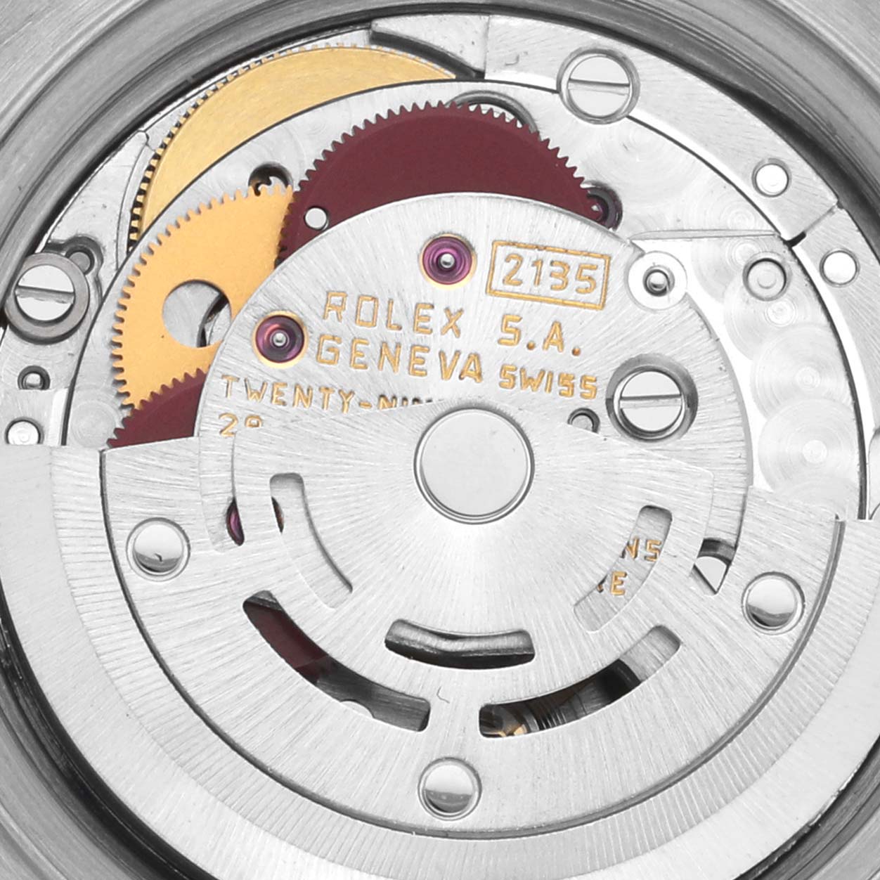 The image shows the internal mechanism of a Rolex Datejust 69173 Women's Steel and Gold (two tone) Champagne Dial 69173 Women's Steel and Gold (two tone) Champagne Dial, focusing on the movement gears and rotor.