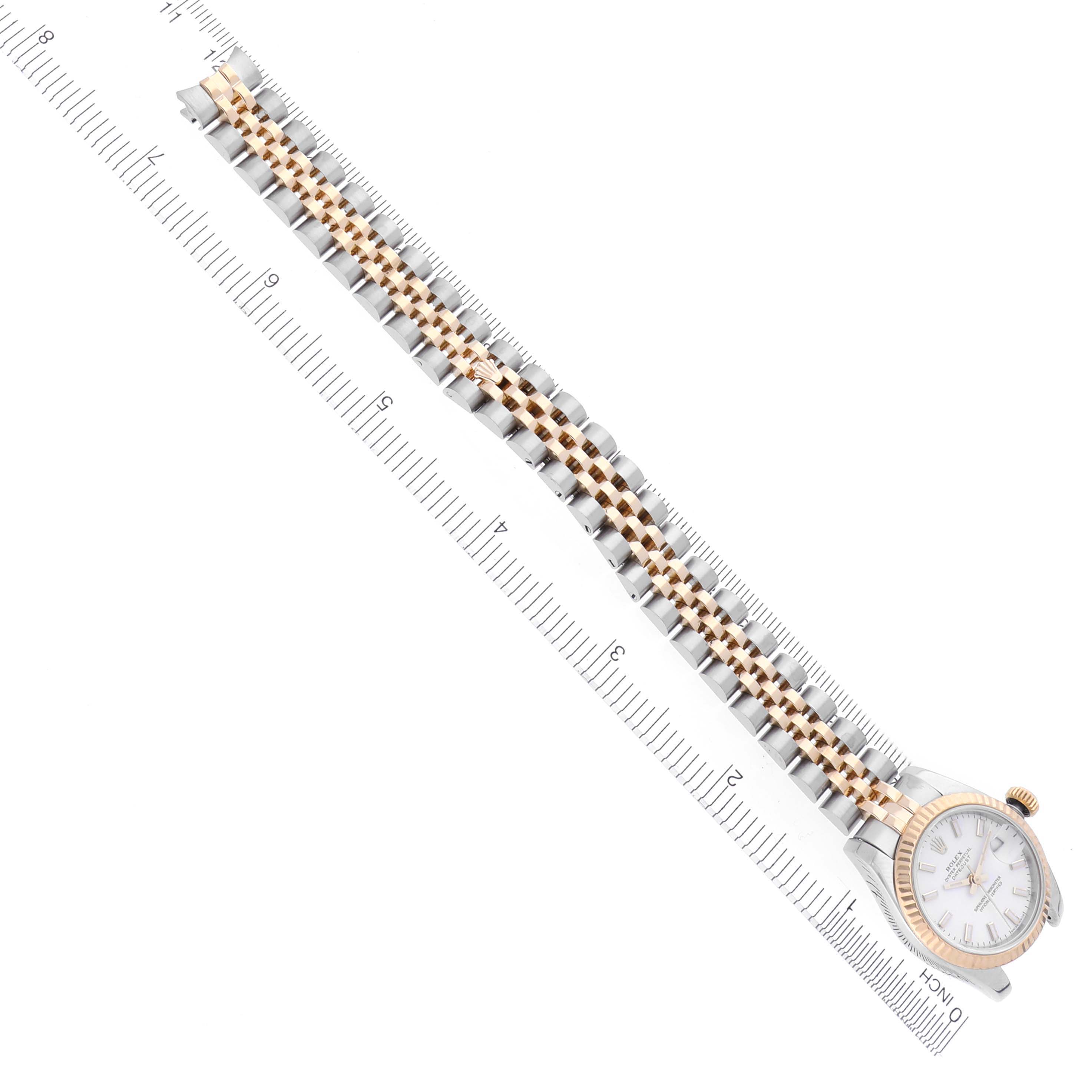 The image shows a Rolex Datejust 179173 Women's Steel and Gold (two tone) White Dial 179173 Women's Steel and Gold (two tone) White Dial watch at an angle, highlighting the face and full length of the bracelet.