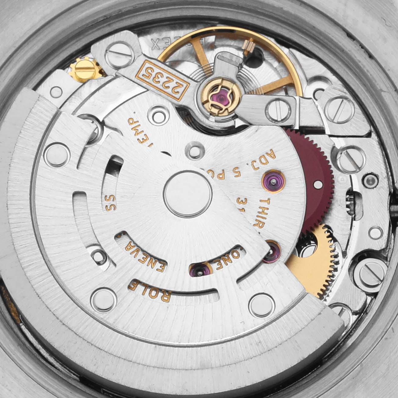 The image shows the intricate movement mechanism of a Rolex Datejust 179173 Women's Steel and Gold (two tone) White Dial 179173 Women's Steel and Gold (two tone) White Dial watch from a rear angle.