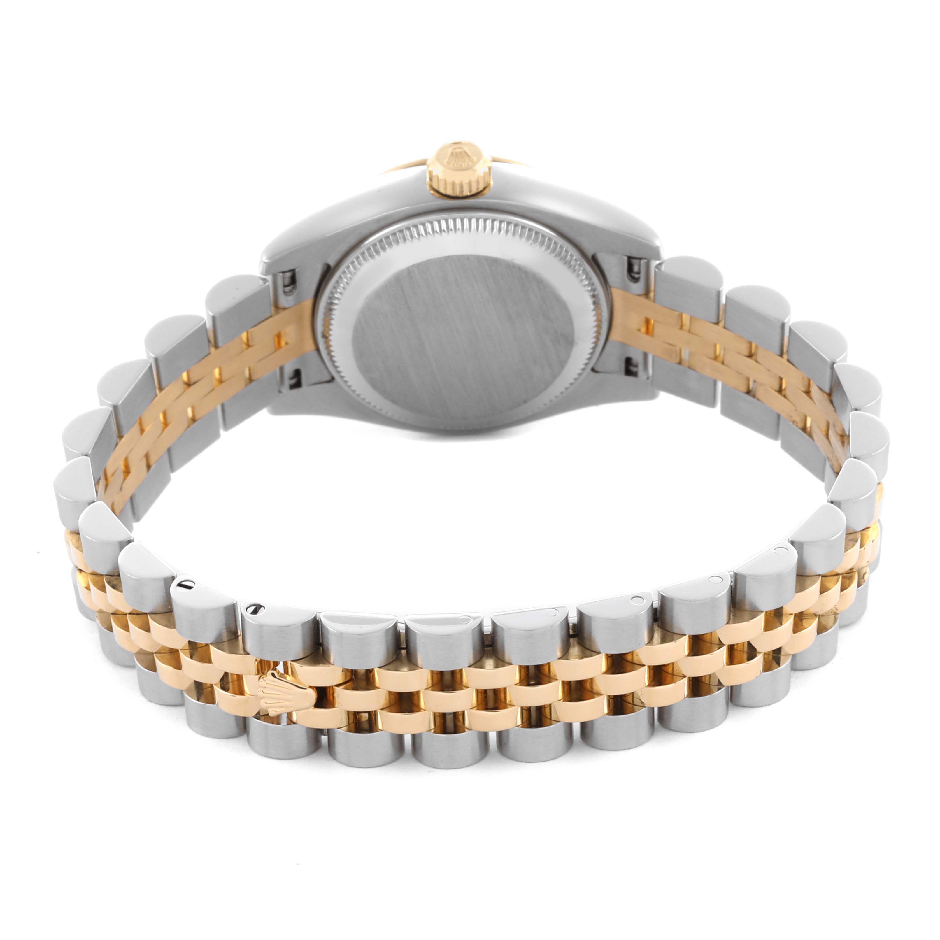 The image shows the back and bracelet of a Rolex Datejust 179173 Women's Steel and Gold (two tone) White Dial 179173 Women's Steel and Gold (two tone) White Dial watch, highlighting the case back and the two-tone metal links.