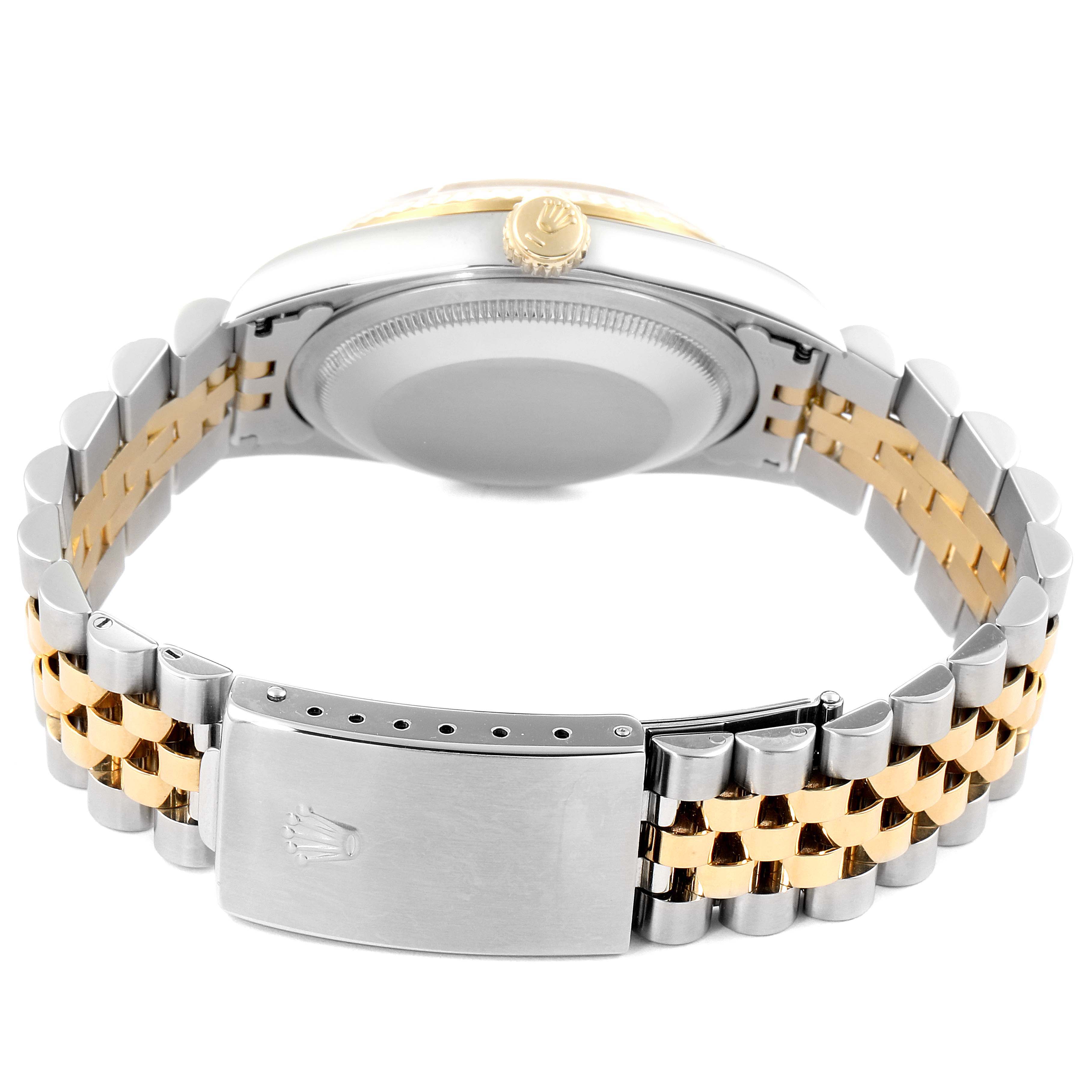 The image shows the back, crown, and bracelet of a Rolex Datejust 16233 Men's Steel and Gold (two tone) White Dial 16233 Men's Steel and Gold (two tone) White Dial watch in a two-tone metal finish.