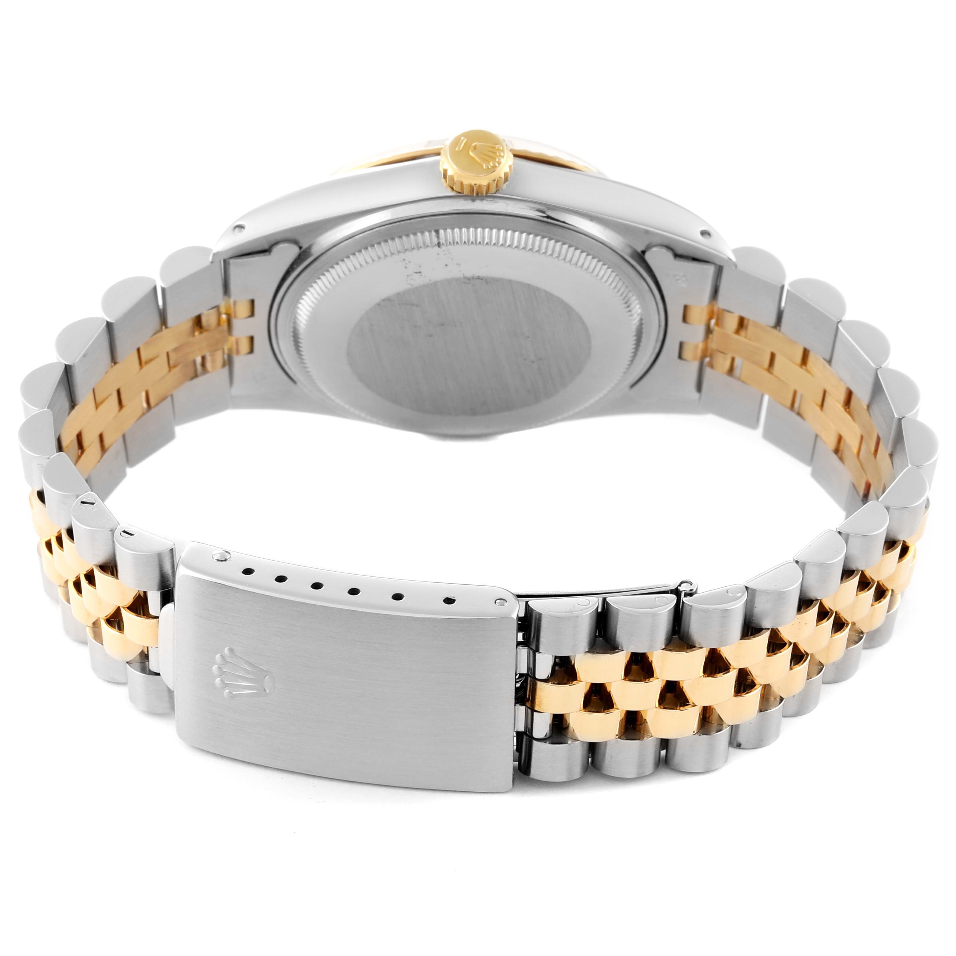 This image shows the back angle of a Rolex Datejust 16013 Men's Steel and Gold (two tone) White Dial 16013 Men's Steel and Gold (two tone) White Dial, highlighting the clasp, crown, and two-tone metal bracelet.