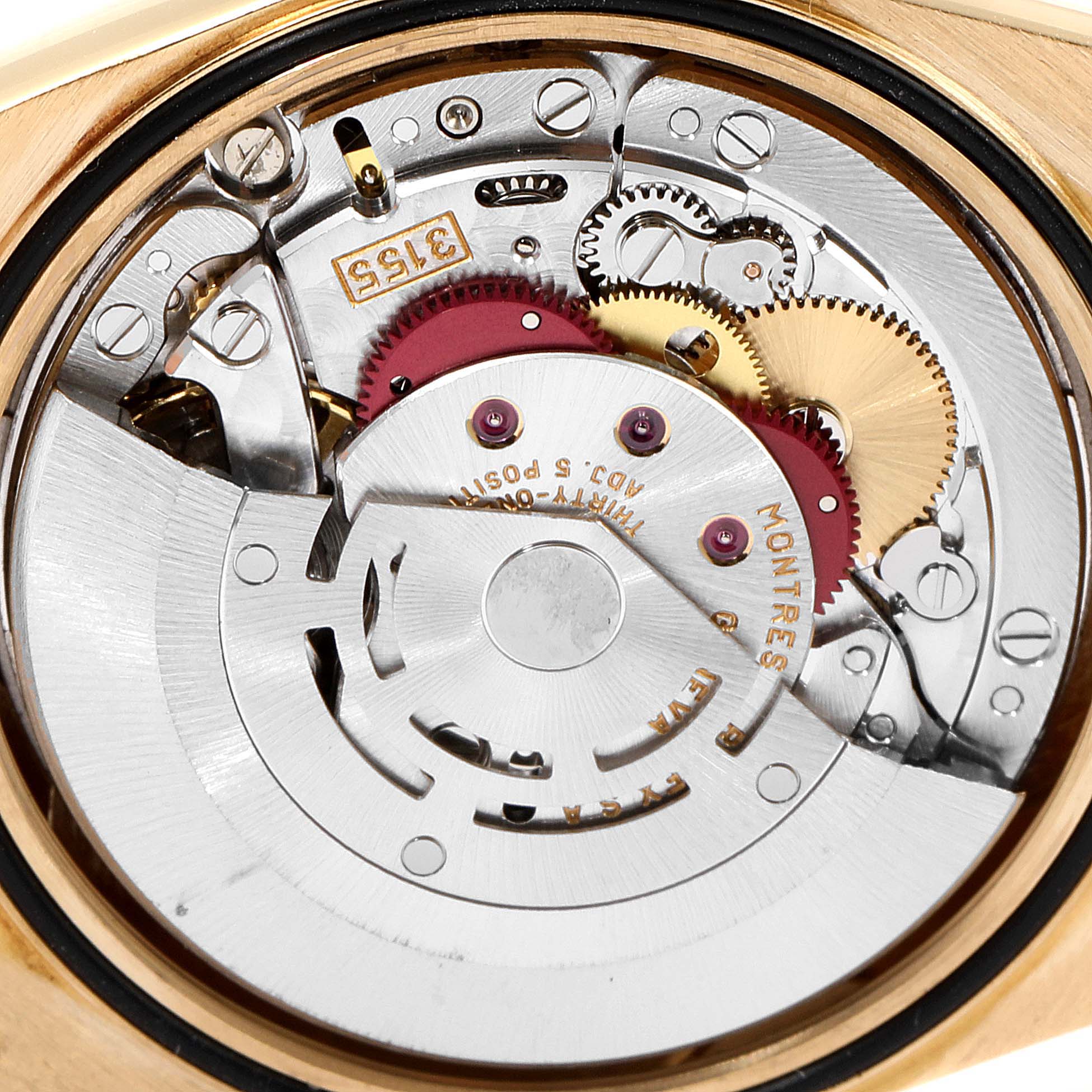 This is a close-up view of the movement of a Rolex President 18248 Men's Yellow Gold Silver Dial 18248 Men's Yellow Gold Silver Dial model watch, showing detailed internal gears and components.