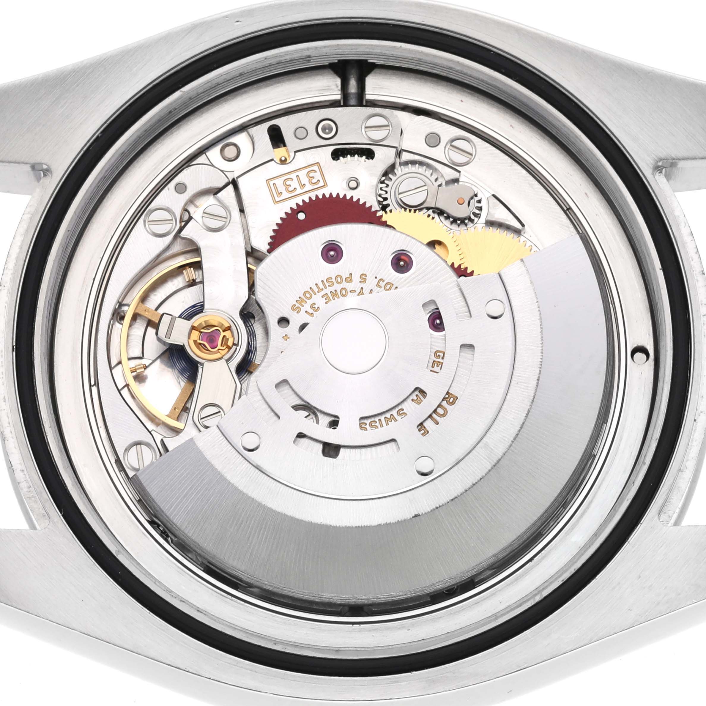 The image shows the movement mechanism of a Rolex Air-King 116900 Men's Stainless Steel Black Dial 116900 Men's Stainless Steel Black Dial watch from the back angle.