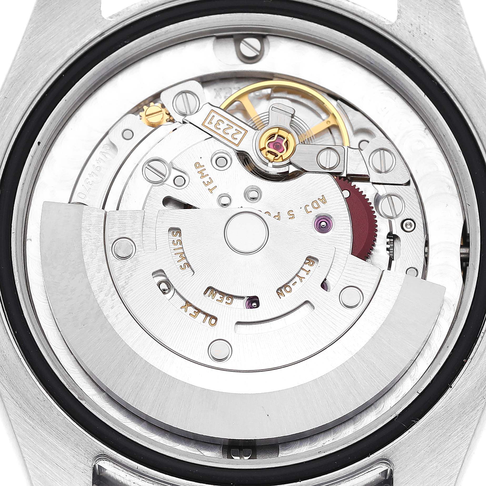 This image shows the internal mechanism and movement parts of a Rolex Mid-Size 177200 Women's Stainless Steel Purple Dial 177200 Women's Stainless Steel Purple Dial model watch from a back angle.