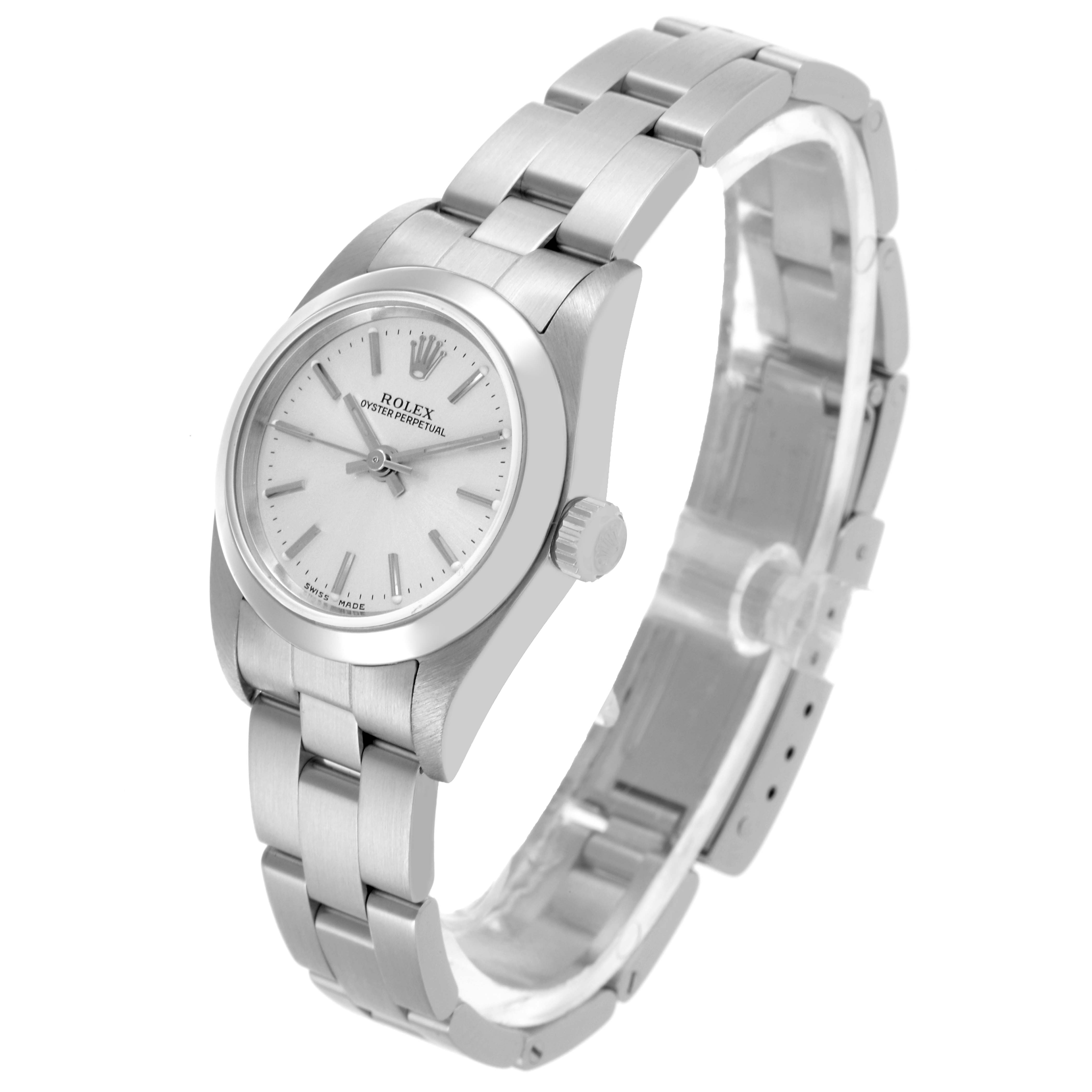 The Rolex Oyster Perpetual 76080 Women's Stainless Steel Silver Dial 76080 Women's Stainless Steel Silver Dial watch is shown at a three-quarter angle, highlighting the dial, bezel, and bracelet.
