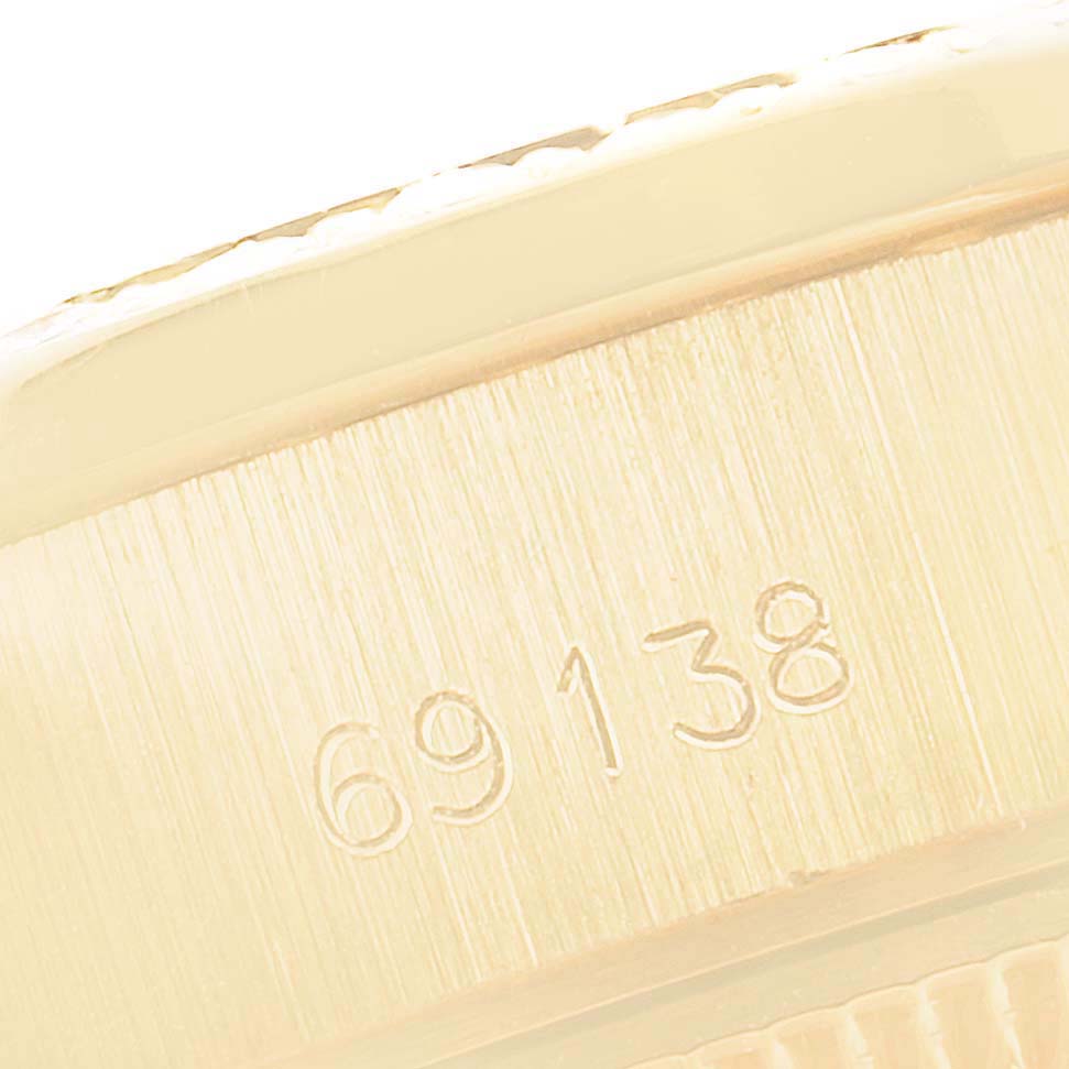 The image shows a close-up of the side of the case for the President model by Rolex, displaying the model number "69138".
