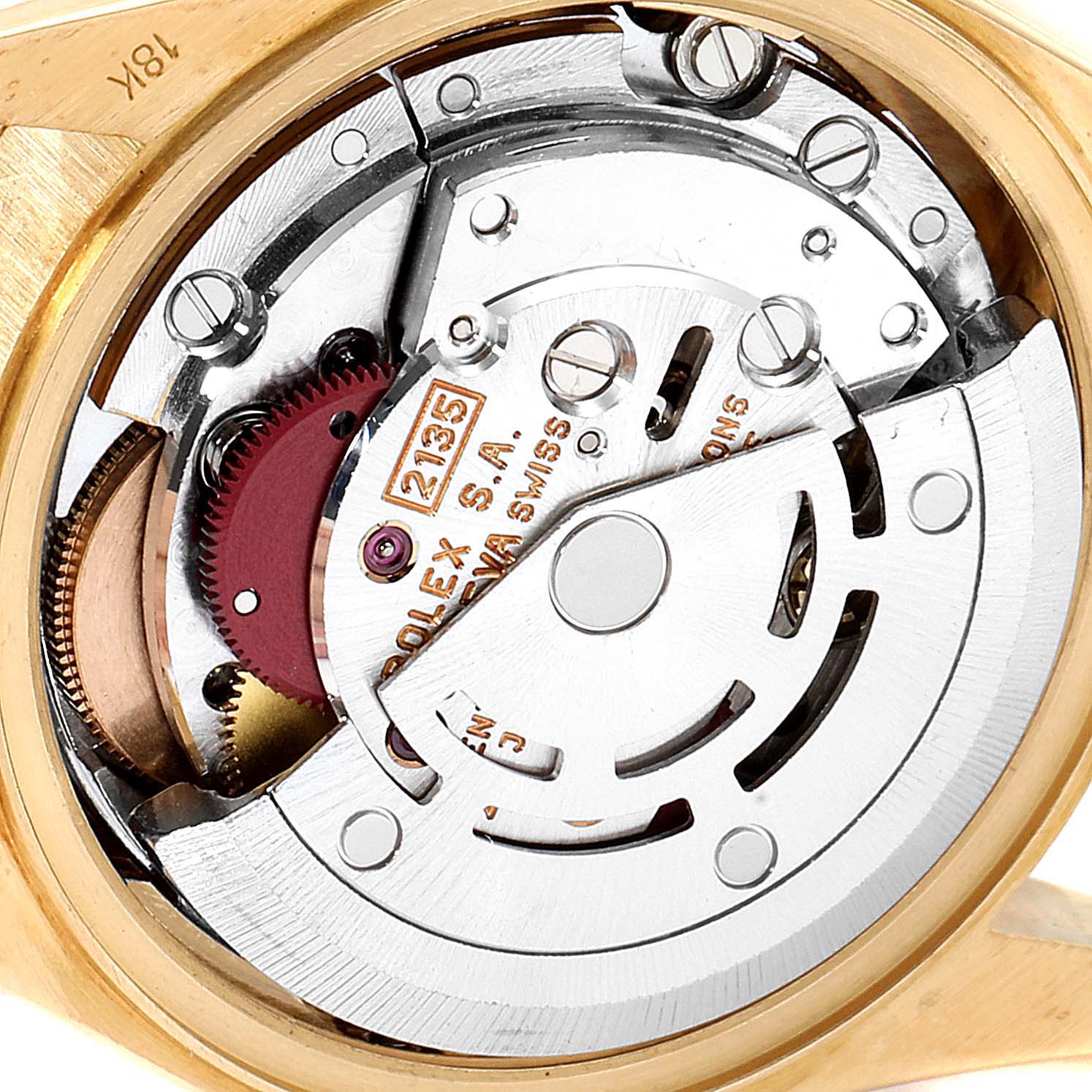 The image shows a close-up of the internal mechanism of a Rolex President 69178 Women
s Yellow Gold Champagne Dial 69178 Women
s Yellow Gold Champagne Dial model watch, highlighting its movement parts.