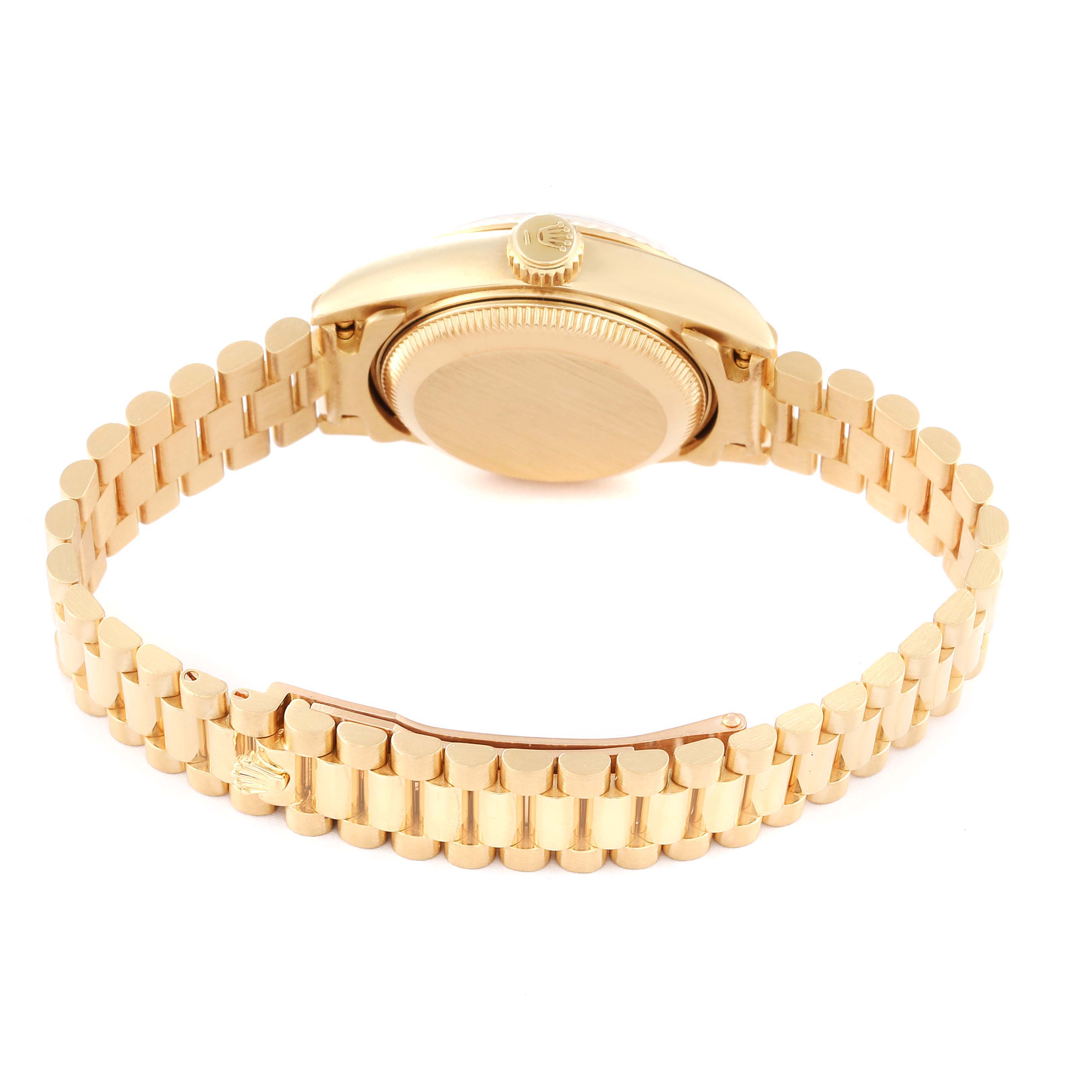 The image shows the backside and clasp of a Rolex President 69178 Women's Yellow Gold Champagne Dial 69178 Women's Yellow Gold Champagne Dial model watch from a slight angle.