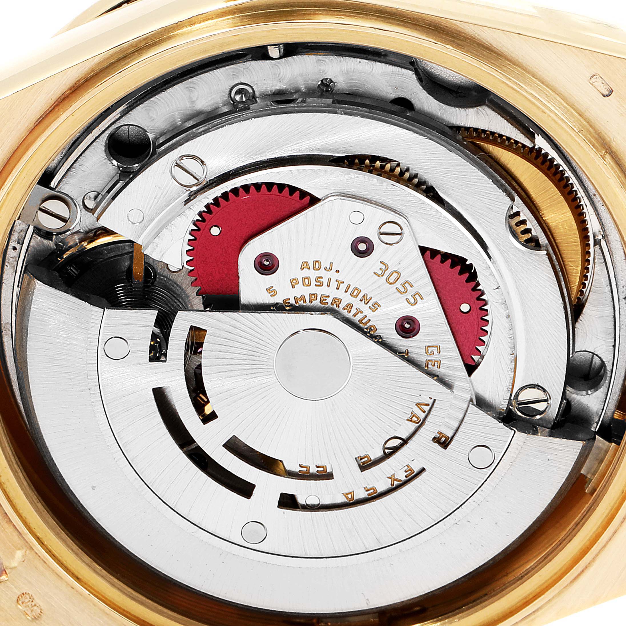 The image shows a close-up of the Rolex President 18138 Men's Yellow Gold Champagne Dial 18138 Men's Yellow Gold Champagne Dial model's movement, specifically its intricate internal mechanics.