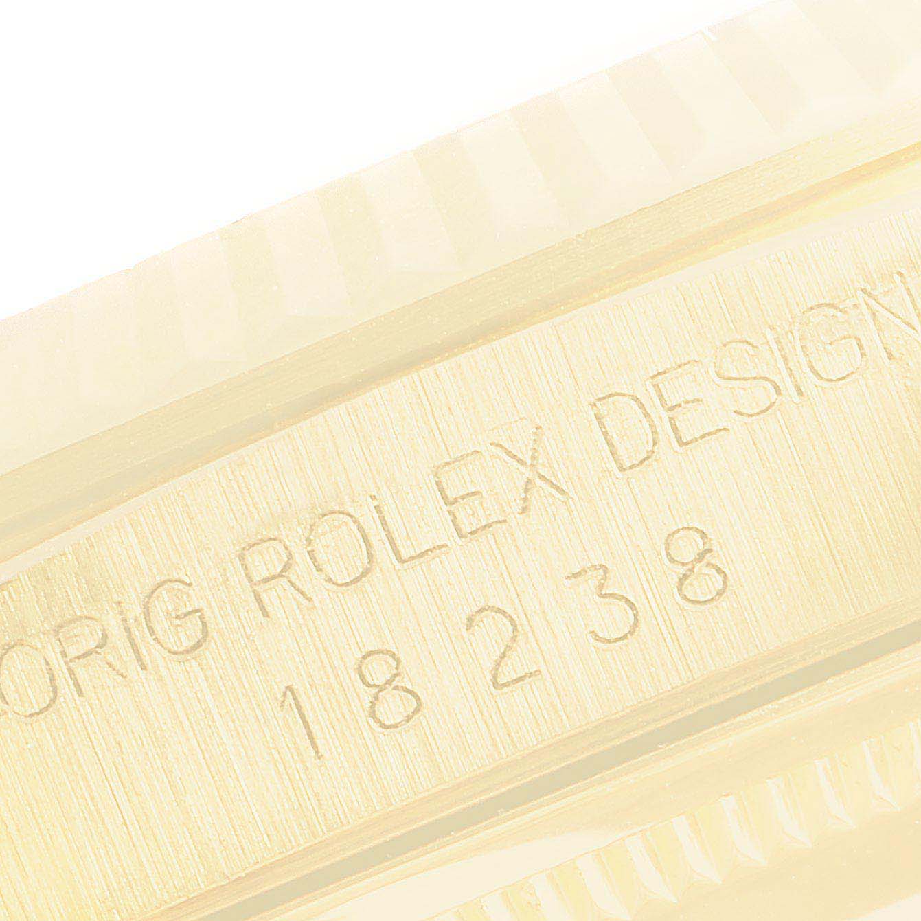 This image shows a close-up of the engraved model number on the case of the Rolex President 18238 Men's Yellow Gold Champagne Dial 18238 Men's Yellow Gold Champagne Dial watch.