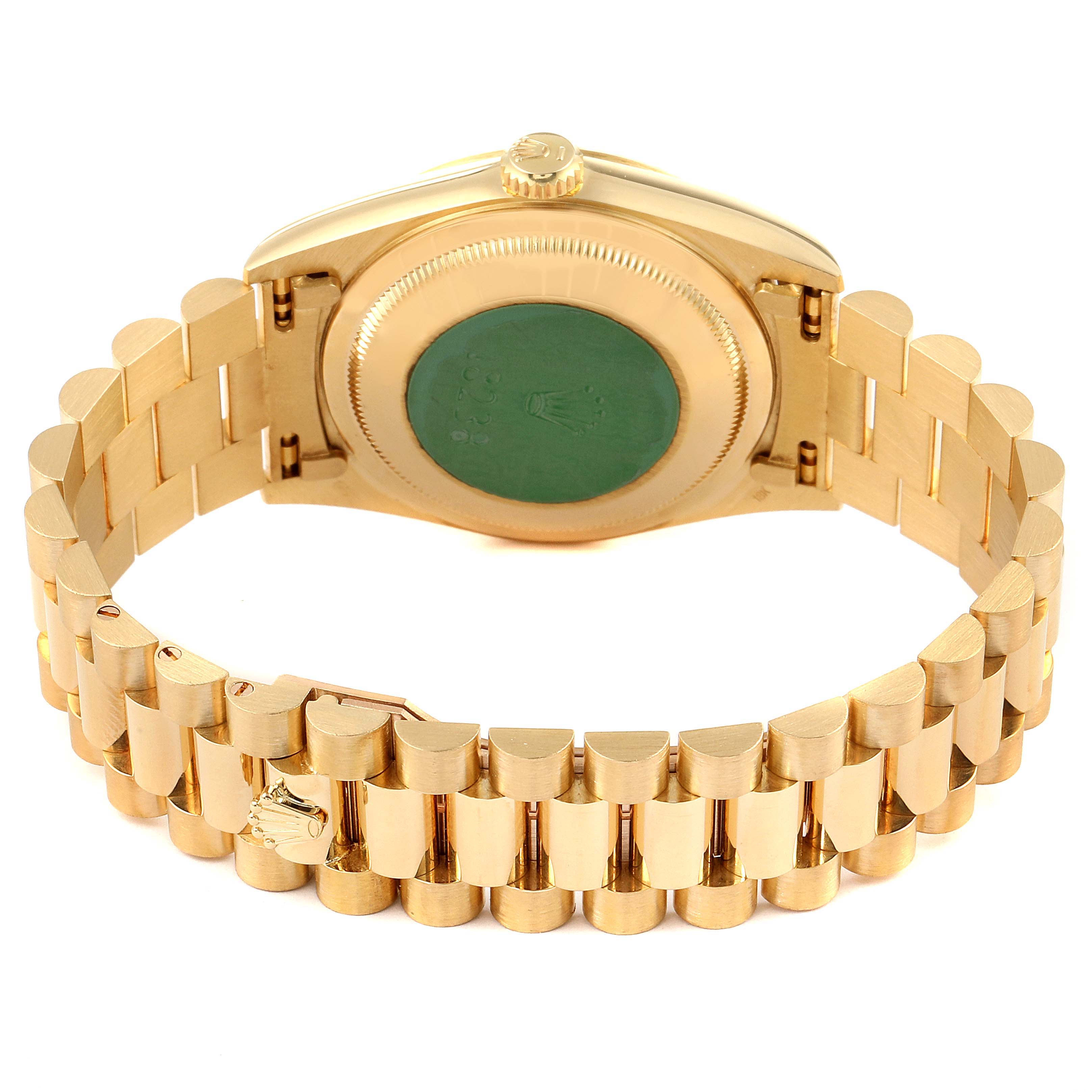 The image shows the back and bracelet of a Rolex President 18238 Men's Yellow Gold Champagne Dial 18238 Men's Yellow Gold Champagne Dial model watch in a gold finish.