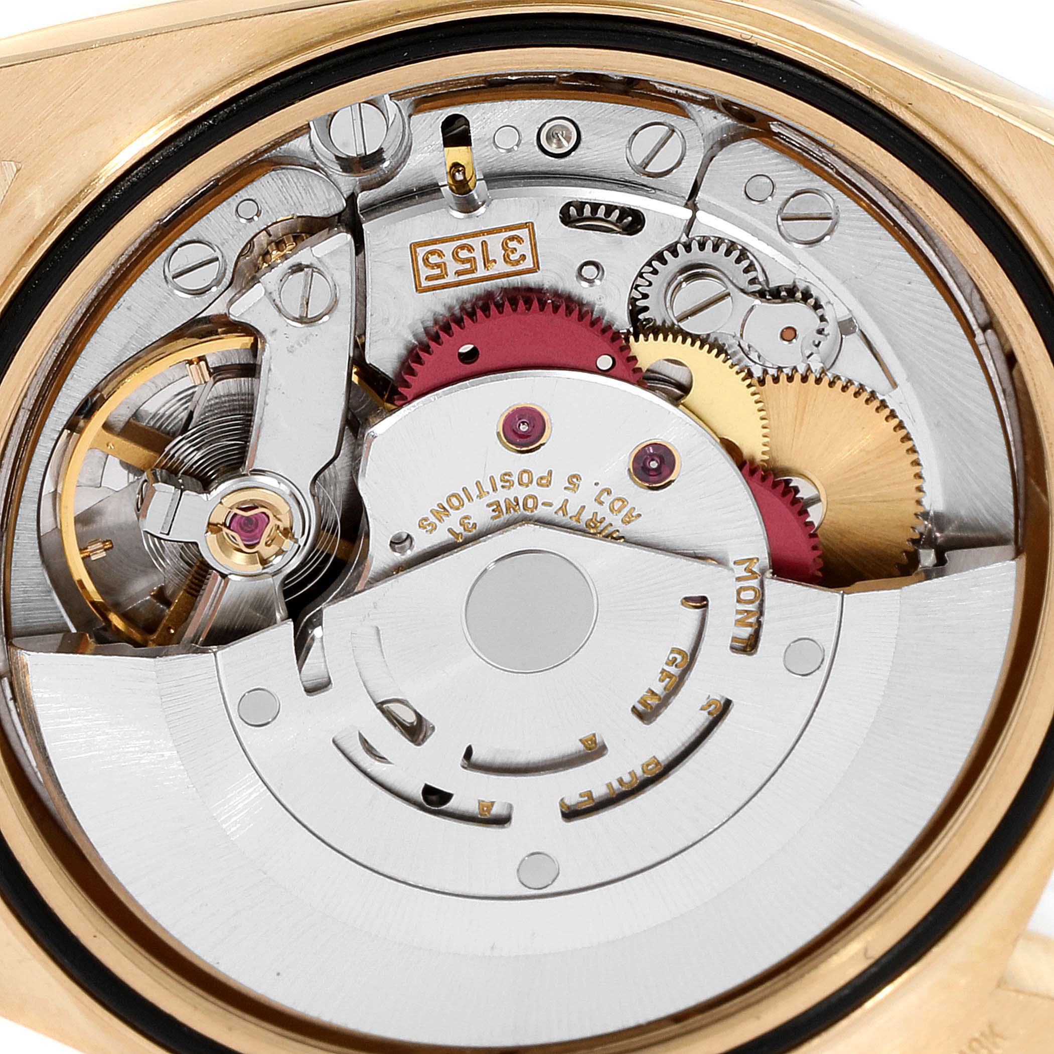 The image shows the intricate internal movement mechanism of a Rolex President 18238 Men's Yellow Gold Champagne Dial 18238 Men's Yellow Gold Champagne Dial model watch at a close-up angle.