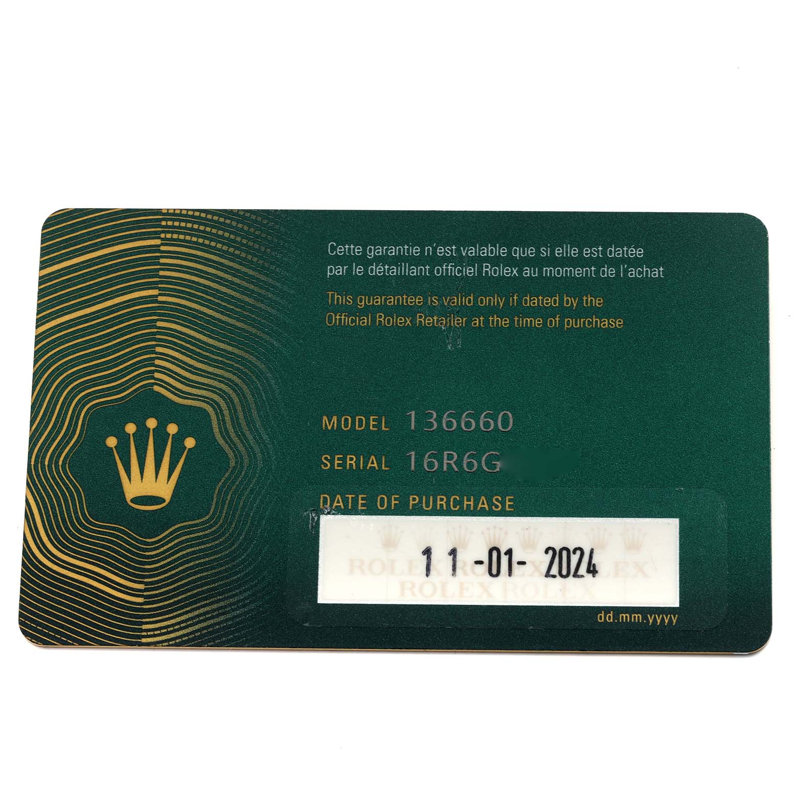 This image shows a warranty card for the Rolex Sea-Dweller 136660 Men
s Stainless Steel Black Dial 136660 Men
s Stainless Steel Black Dial model 136660.