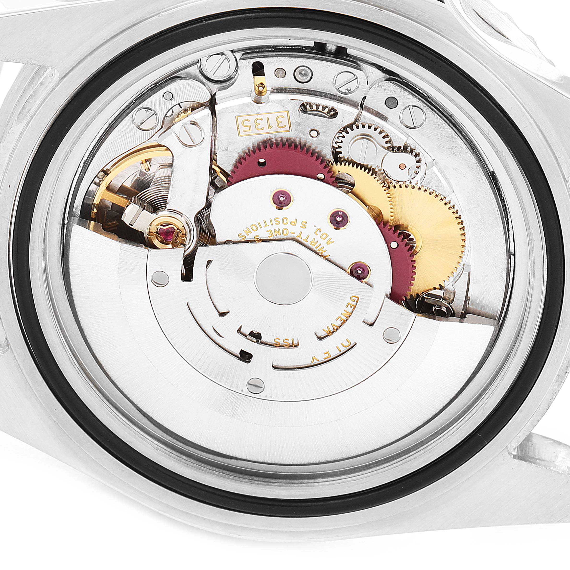 This image shows the movement and inner mechanical parts of a Rolex Submariner 16610 Men
s Stainless Steel Black Dial 16610 Men
s Stainless Steel Black Dial watch from a back angle.