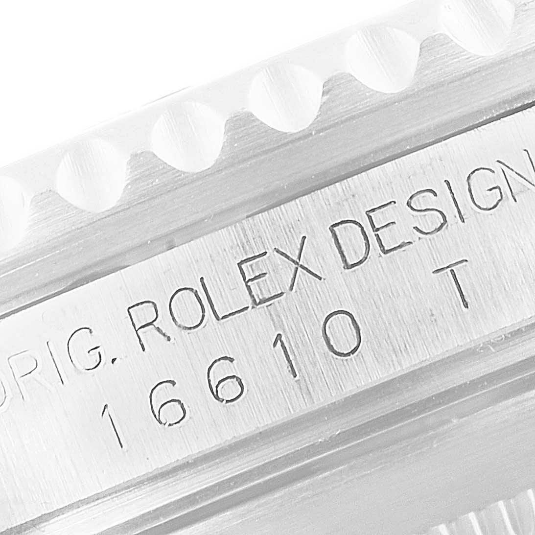 The image shows the side view of a Rolex Submariner 16610 Men
s Stainless Steel Black Dial 16610 Men
s Stainless Steel Black Dial watch case with the model number 16610 engraved.