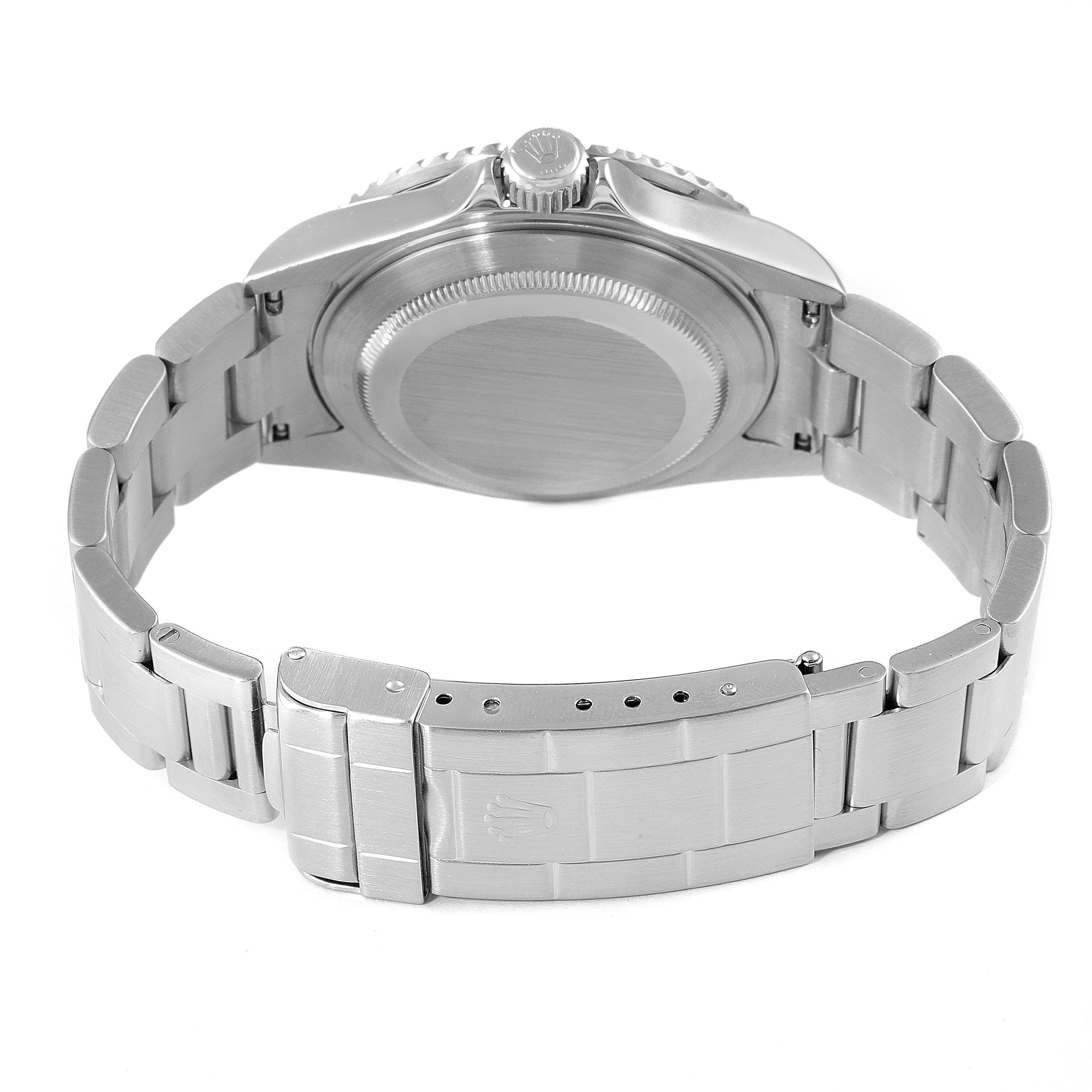 This image shows the back view of a Rolex Submariner 16610 Men
s Stainless Steel Black Dial 16610 Men
s Stainless Steel Black Dial watch, highlighting the case back and the bracelet with the clasp.