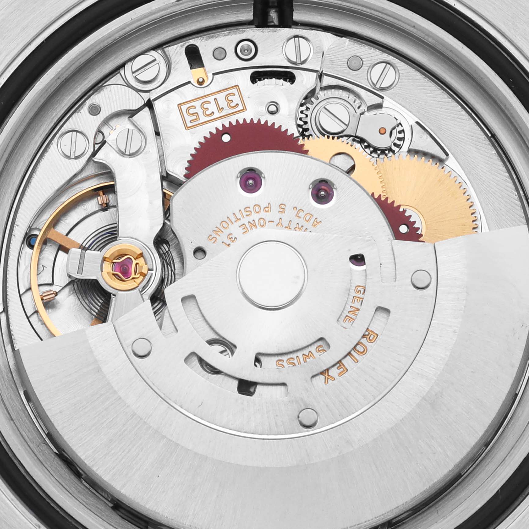 The image shows the inner mechanical movement of a Rolex Submariner 116613LB Men's Steel and Gold (two tone) Blue Dial 116613LB Men's Steel and Gold (two tone) Blue Dial, showcasing gears and the rotor.