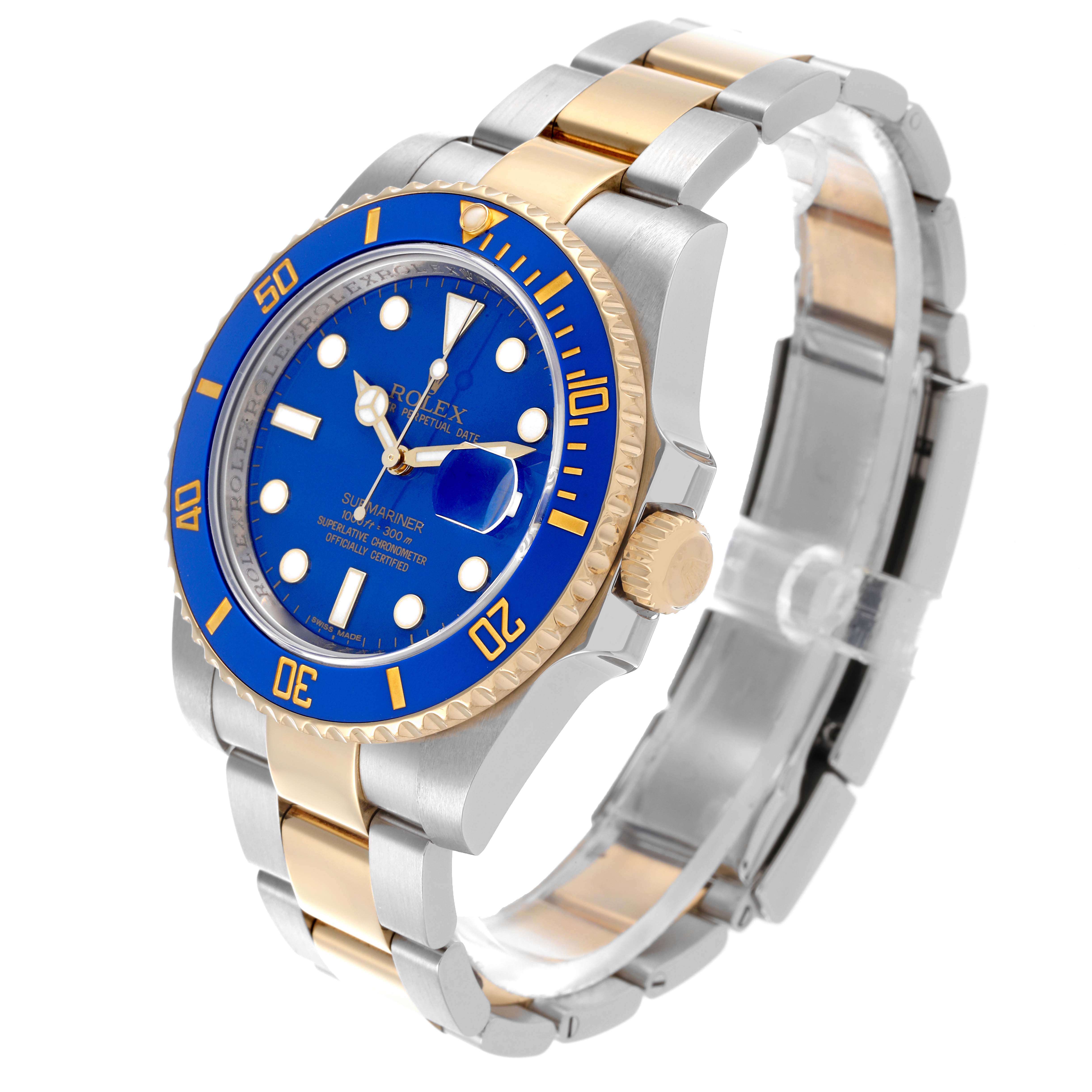 The Rolex Submariner 116613LB Men's Steel and Gold (two tone) Blue Dial 116613LB Men's Steel and Gold (two tone) Blue Dial is shown at a three-quarter angle, highlighting the blue dial, bezel, and two-tone bracelet.