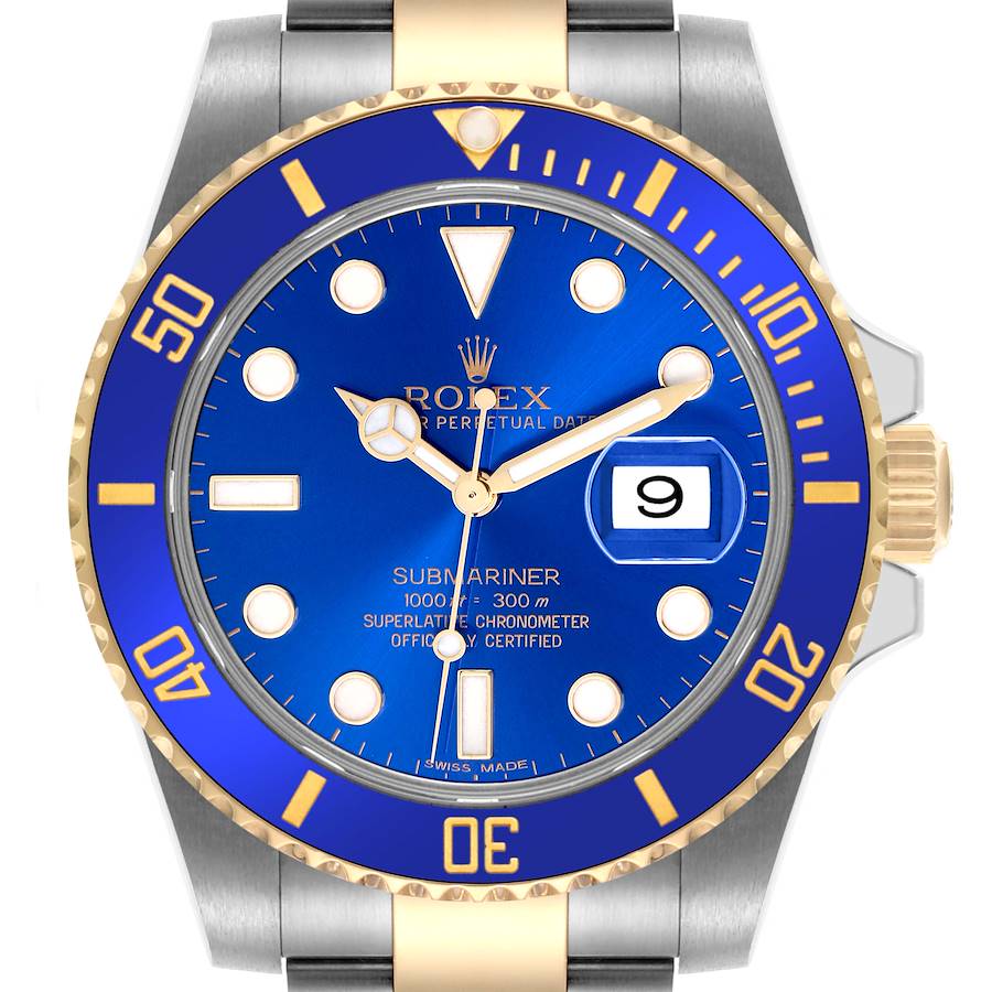 The image shows a frontal view of the Rolex Submariner watch, highlighting the blue dial, gold bezel, and date window.