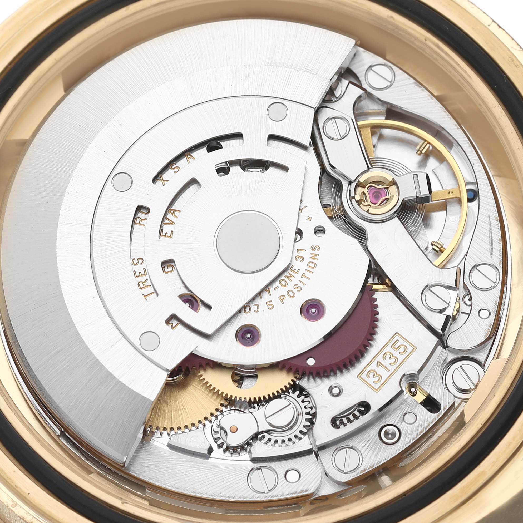 The image shows the internal mechanical movement of the Rolex Submariner 16618 Men's Yellow Gold Blue Dial 16618 Men's Yellow Gold Blue Dial watch from a close-up angle.