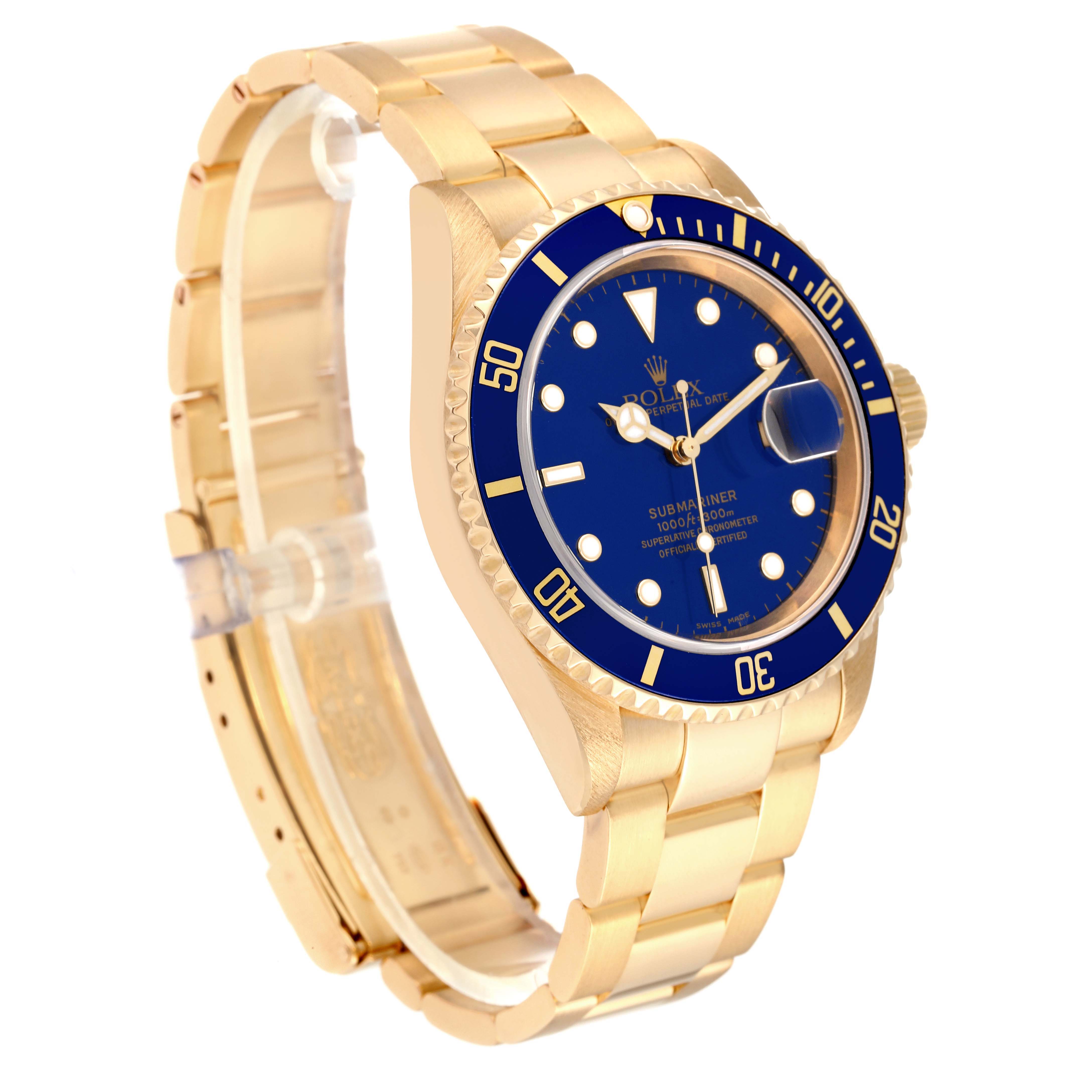 The Rolex Submariner 16618 Men's Yellow Gold Blue Dial 16618 Men's Yellow Gold Blue Dial watch is shown at a three-quarter angle, highlighting the blue dial, bezel, and gold bracelet.