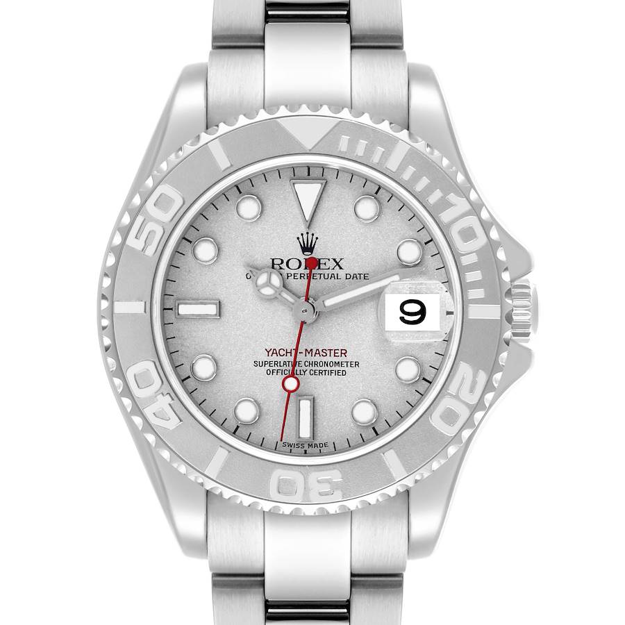 The Rolex Yacht-Master watch is shown from a top-down angle, displaying the face, bezel, and bracelet.