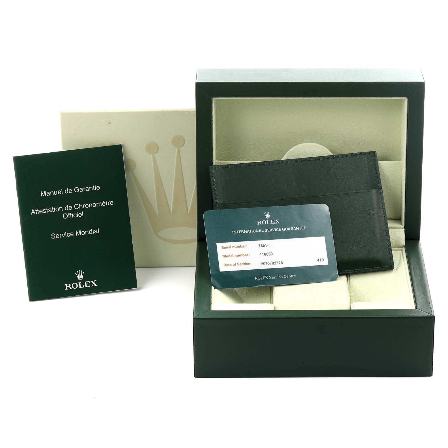 This image shows the packaging and accessories for the Rolex Yacht-Master 116689 Men
s White Gold White Dial 116689 Men
s White Gold White Dial, including a box, booklet, and service card.