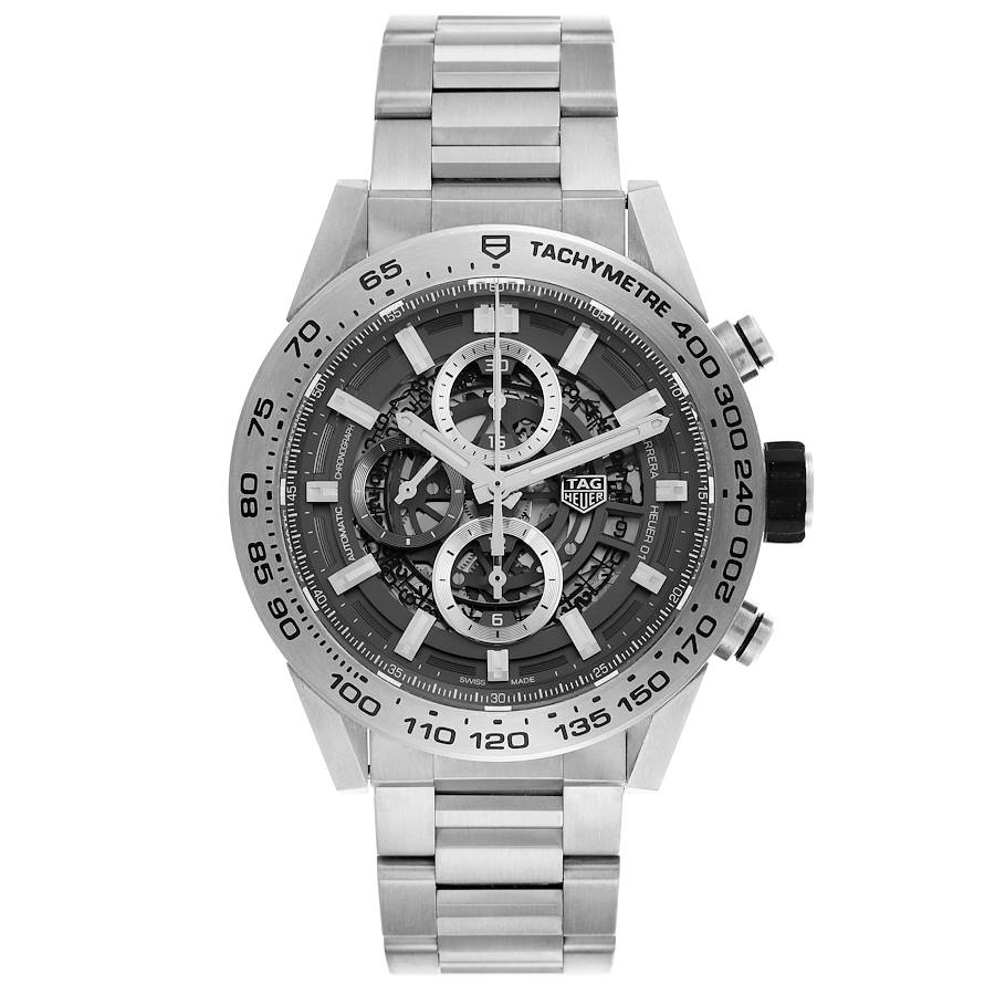 The Tag Heuer Carrera watch is shown from the front, displaying the dial, bezel, and stainless steel bracelet.