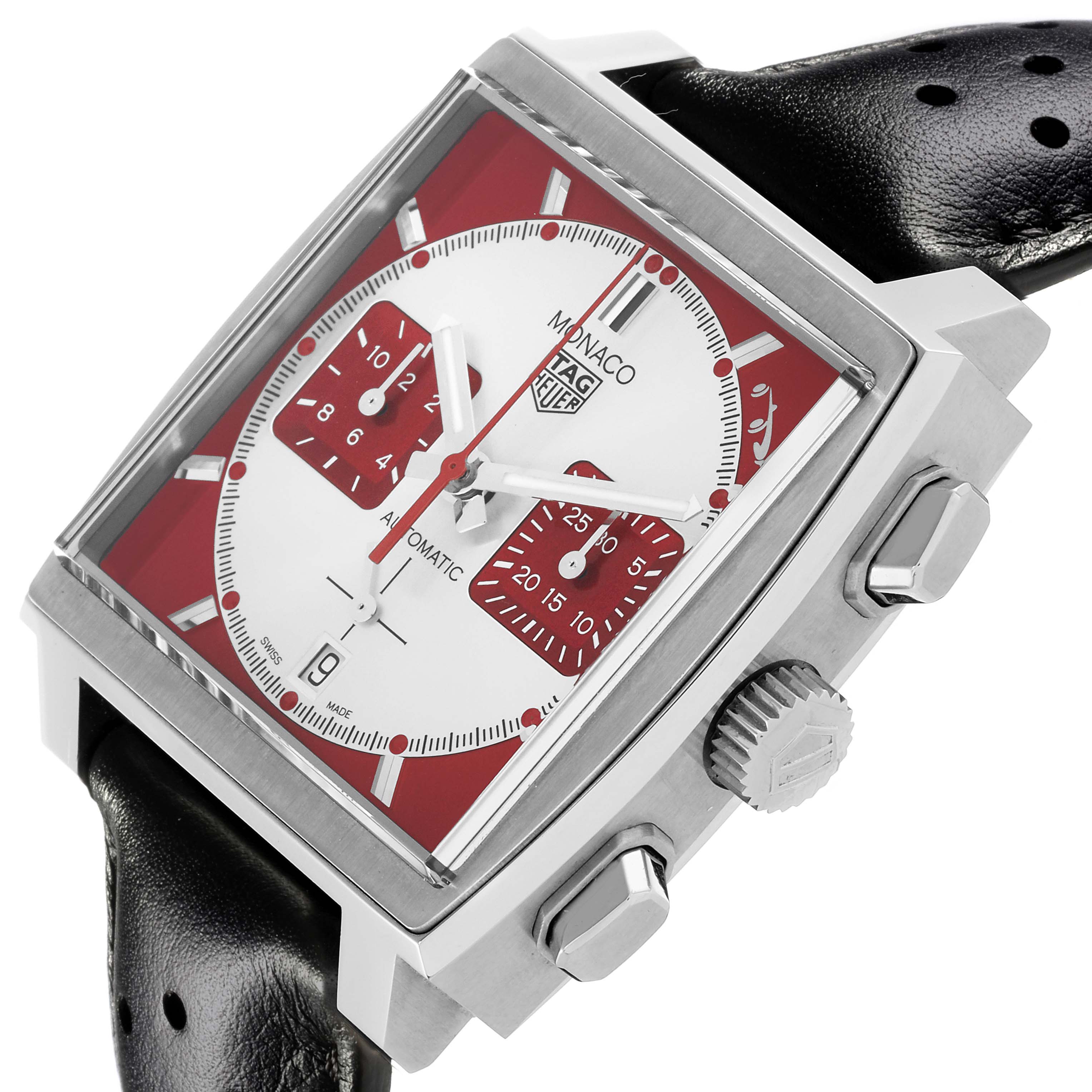 The Monaco model by Tag Heuer is shown at an angled view highlighting the dial, crown, pushers, and part of the strap.