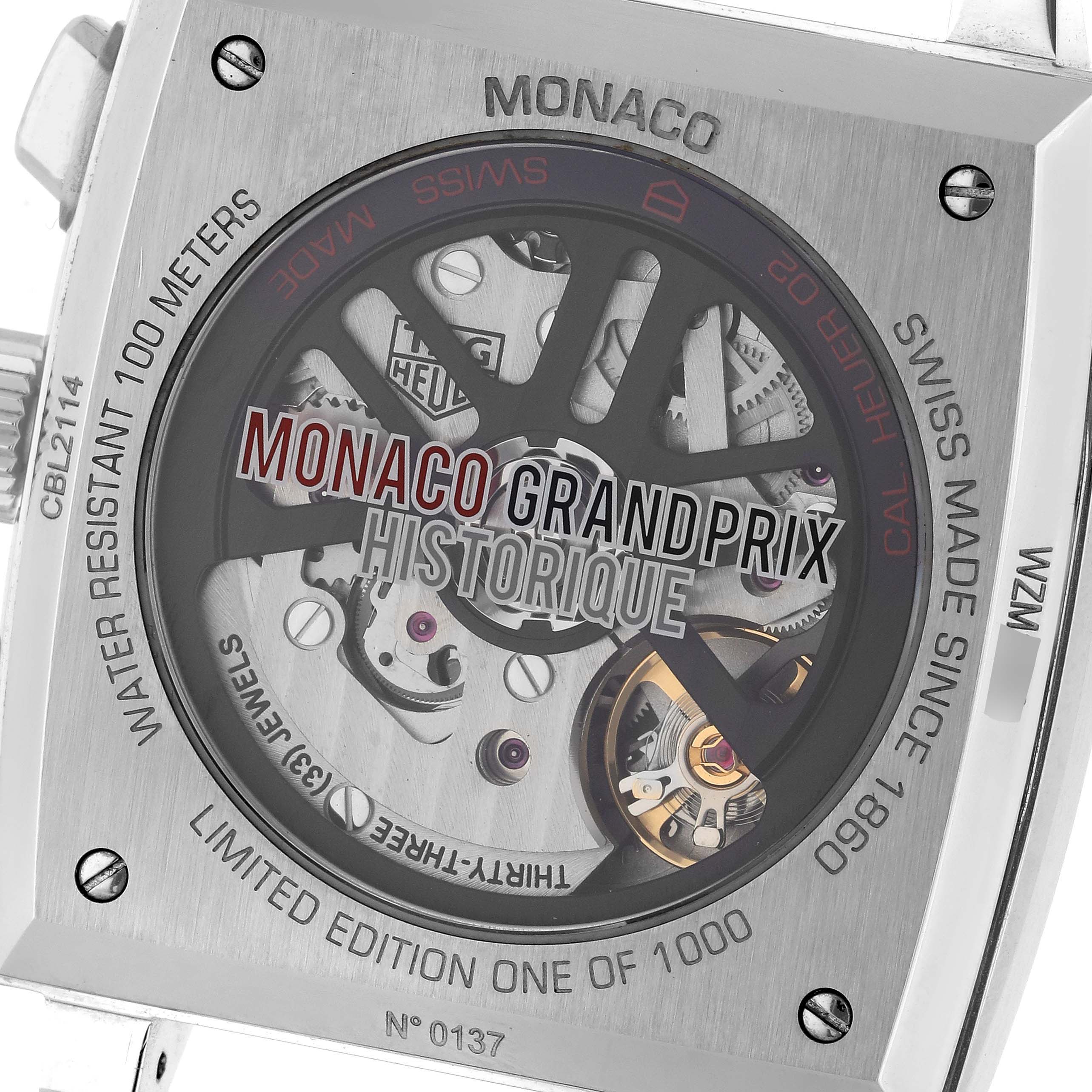 The image shows the back case of a Tag Heuer Monaco CBL2114 Men's Stainless Steel Red Dial CBL2114 Men's Stainless Steel Red Dial watch, displaying its intricate mechanical movement.