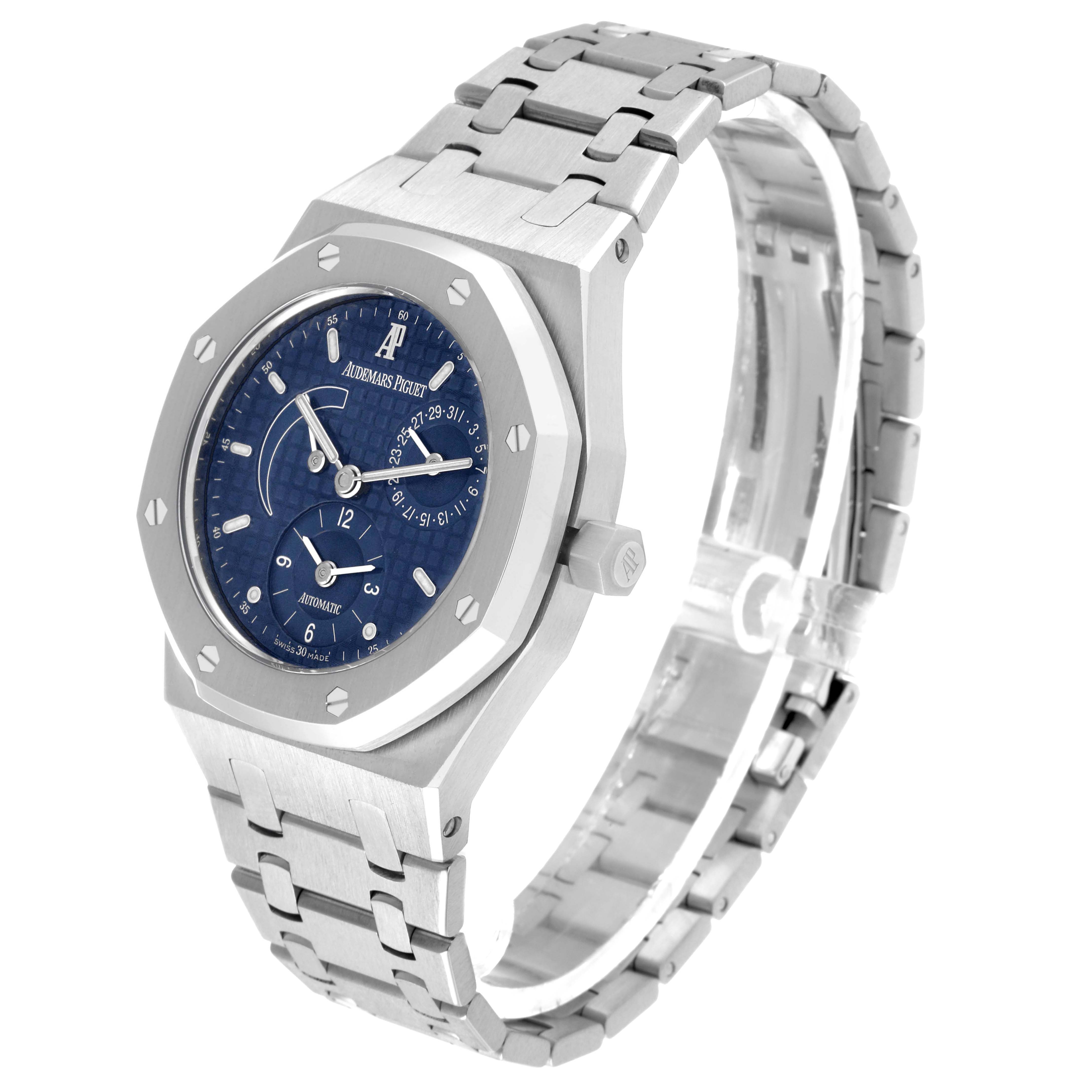 The image shows the Audemars Piguet Royal Oak 25730ST Men's Stainless Steel Blue Dial watch at a three-quarter angle, displaying the face, bezel, and bracelet.
